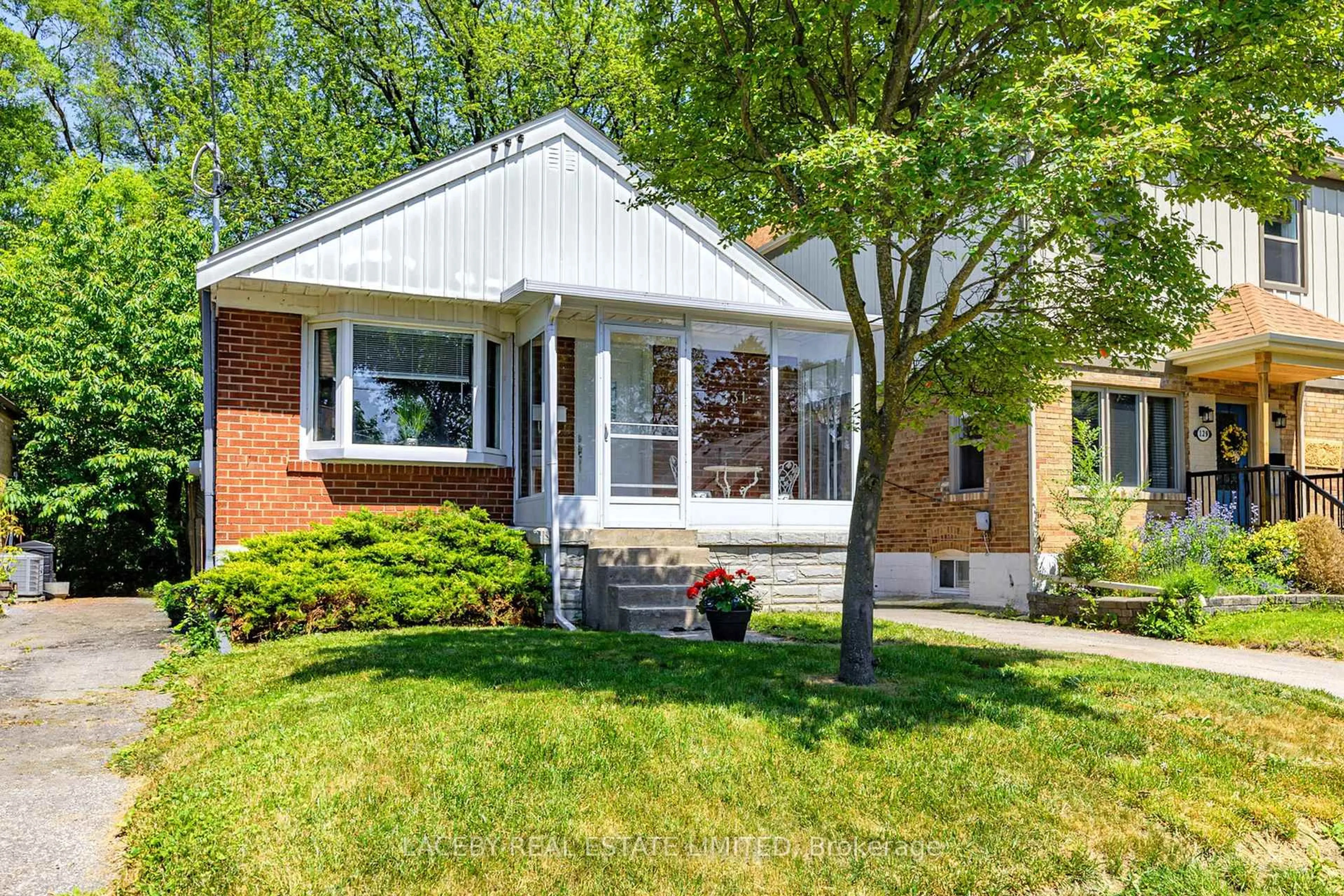 Home with brick exterior material, street for 131 Claremore Ave, Toronto Ontario M1N 3S5