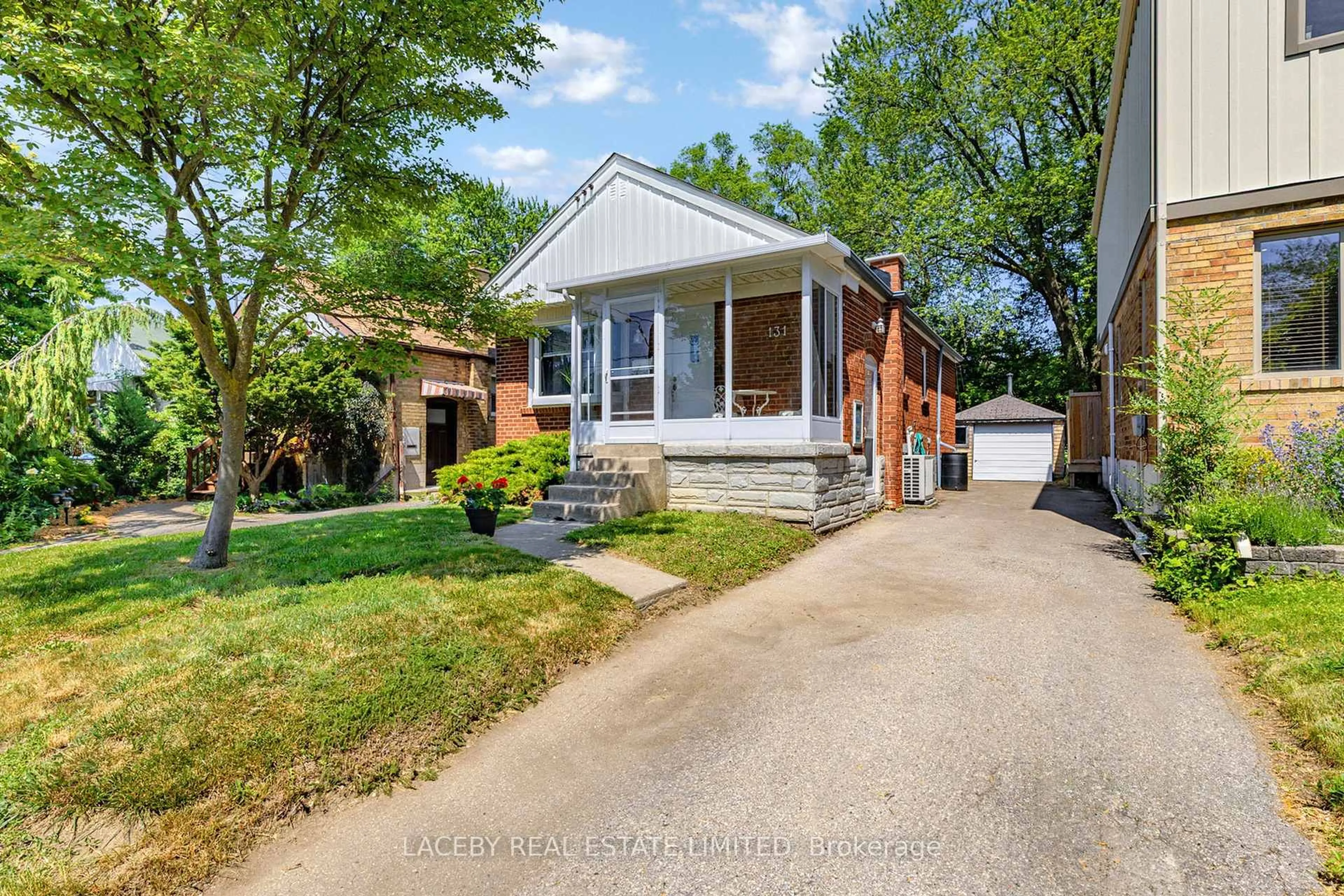 Home with brick exterior material, street for 131 Claremore Ave, Toronto Ontario M1N 3S5