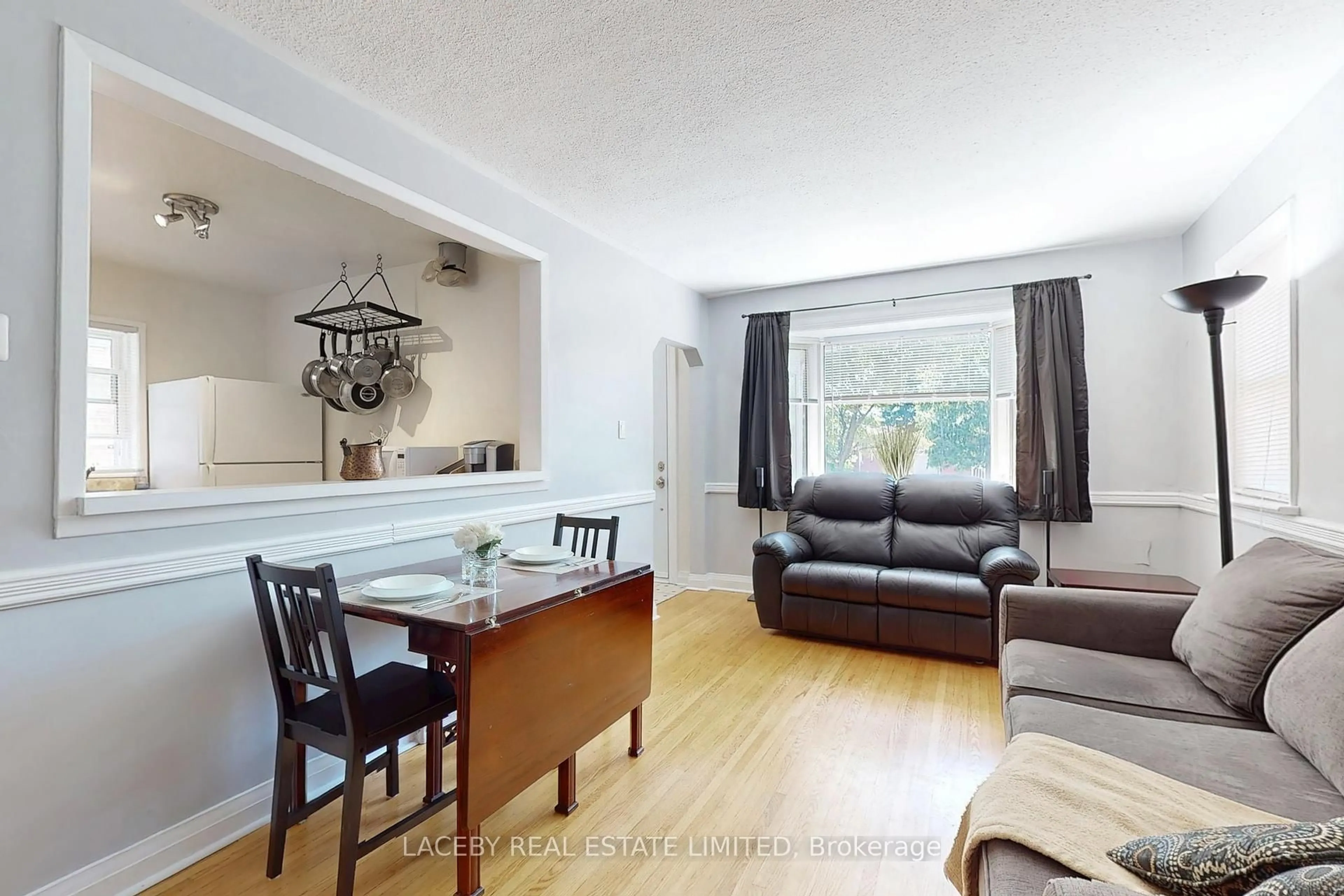 Living room with furniture, unknown for 131 Claremore Ave, Toronto Ontario M1N 3S5