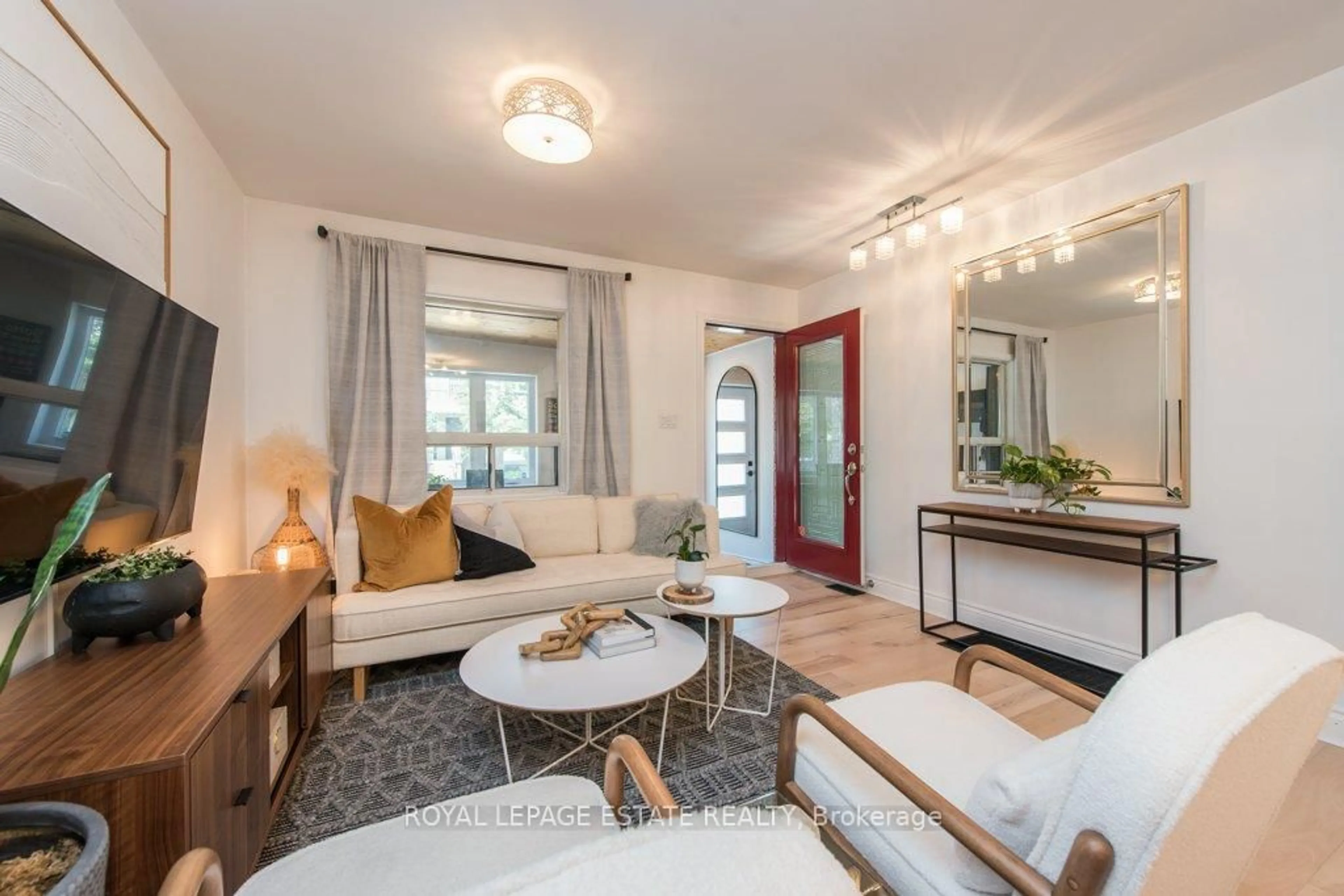 Living room with furniture, unknown for 2311 Gerrard St, Toronto Ontario M4E 2E5