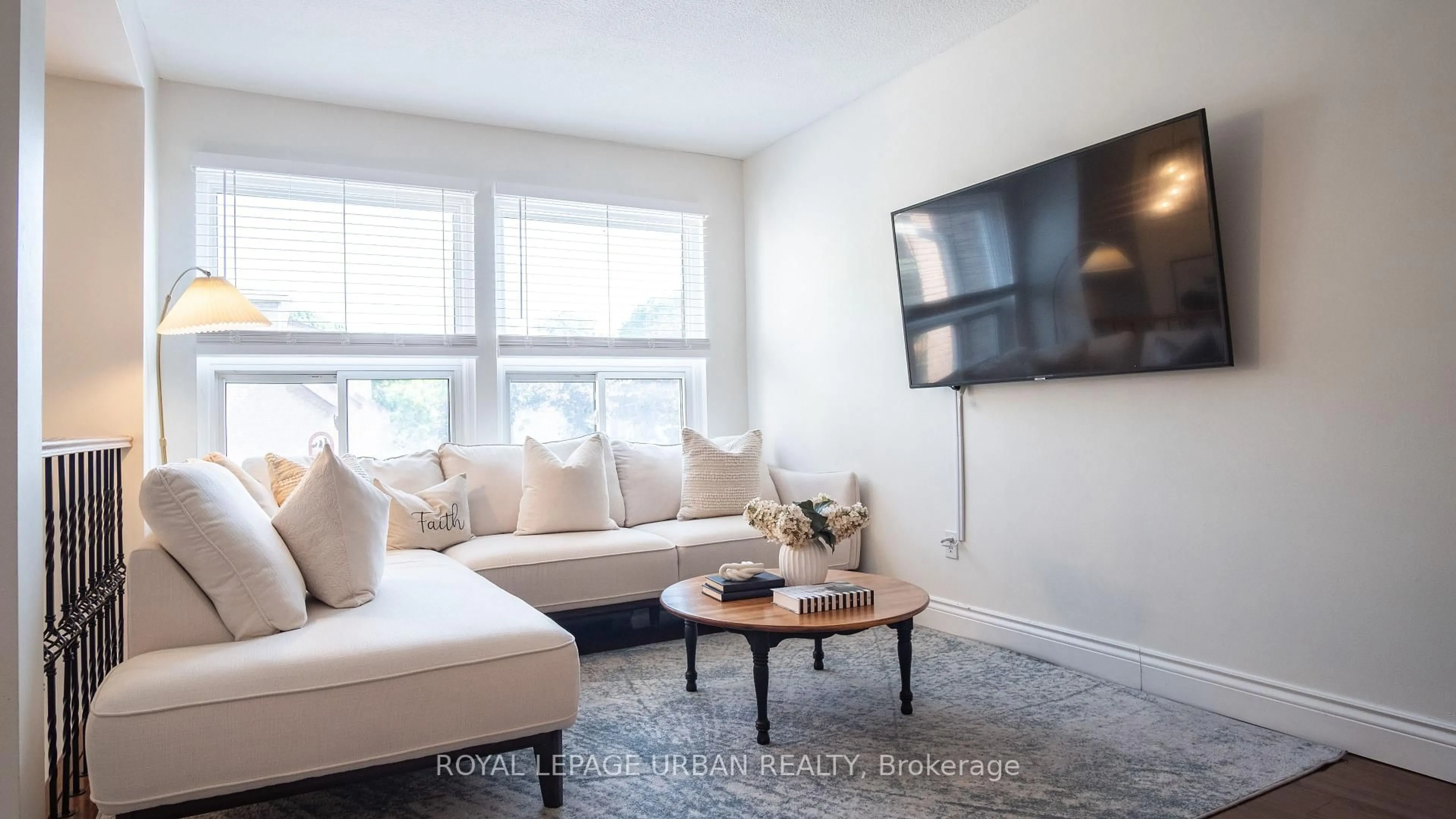 Living room with furniture, wood/laminate floor for 89 Willows Lane, Ajax Ontario L1S 6E7