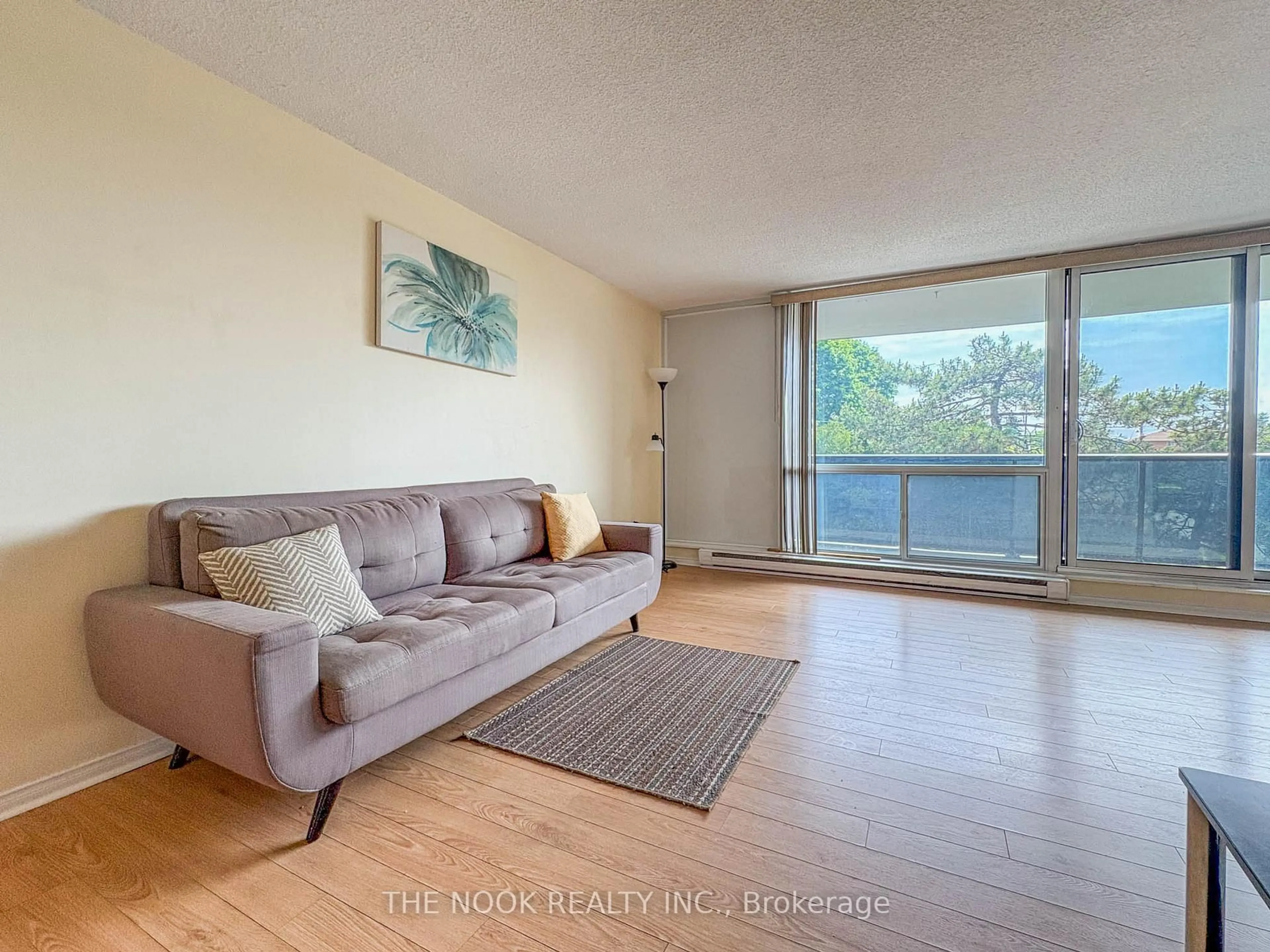 Living room with furniture, wood/laminate floor for 454 Centre St #406, Oshawa Ontario L1H 4C2