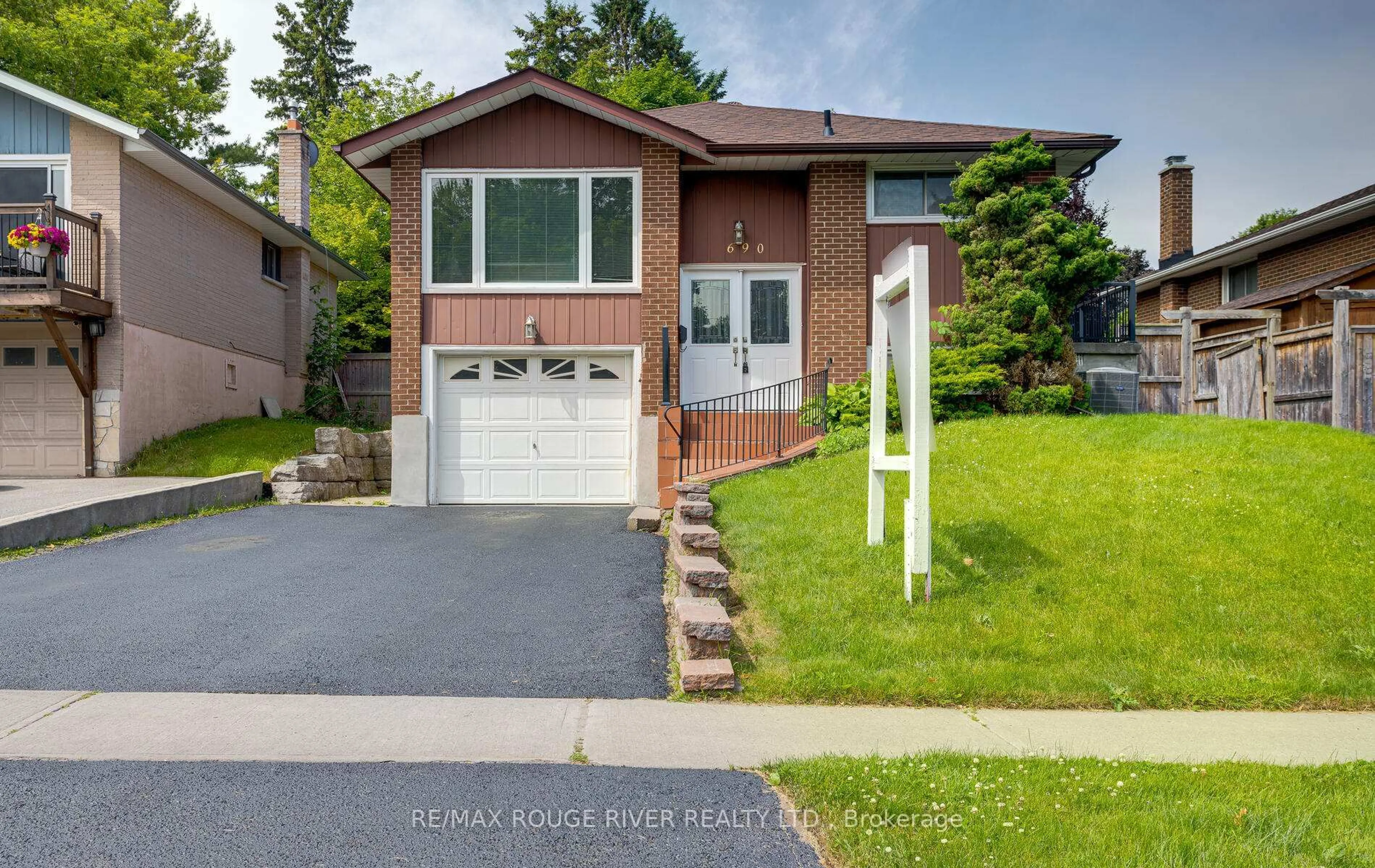 Home with brick exterior material, street for 690 Central Park Blvd, Oshawa Ontario L1G 6A9
