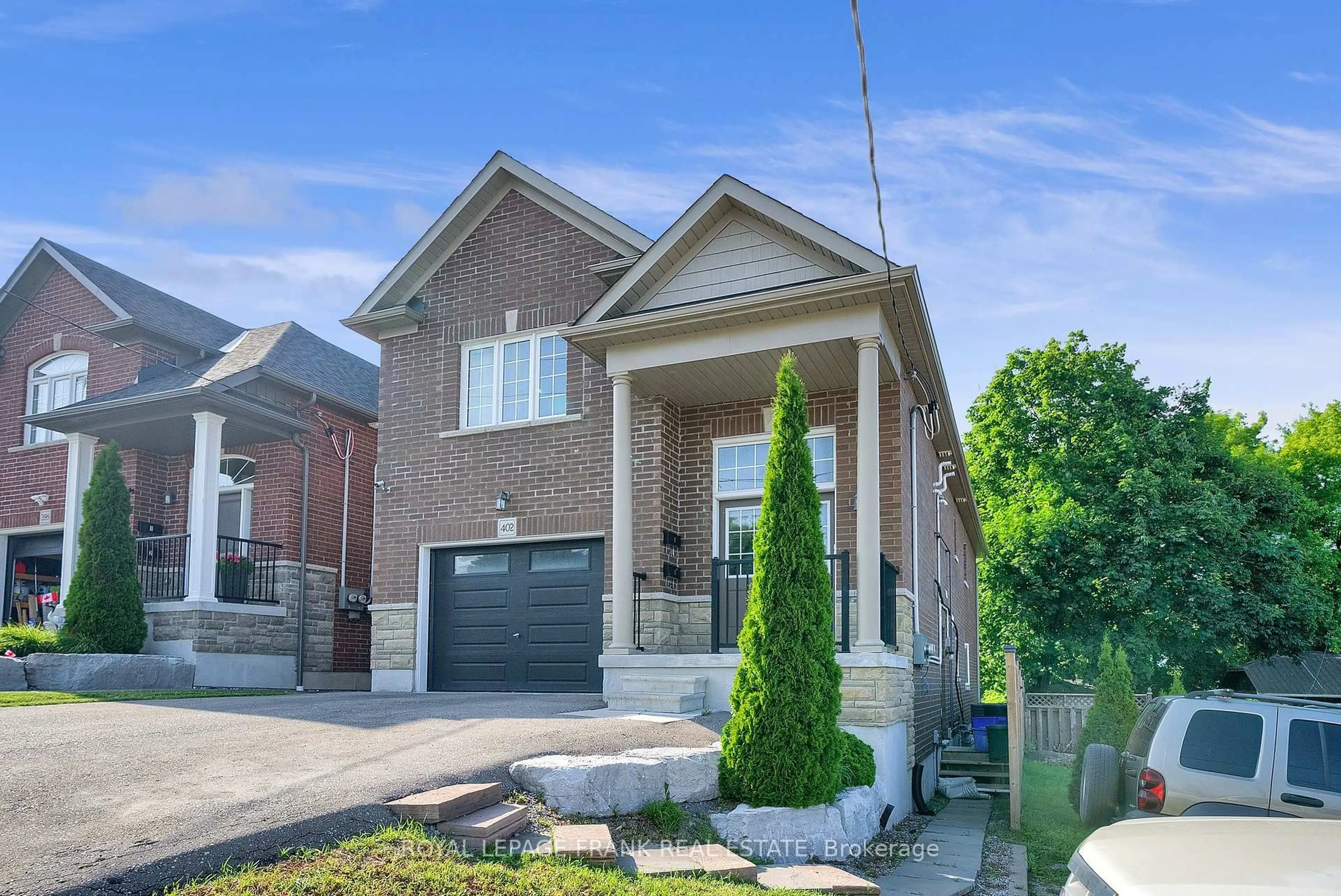 Home with brick exterior material, street for 402 Olive Ave, Oshawa Ontario L1H 2R1