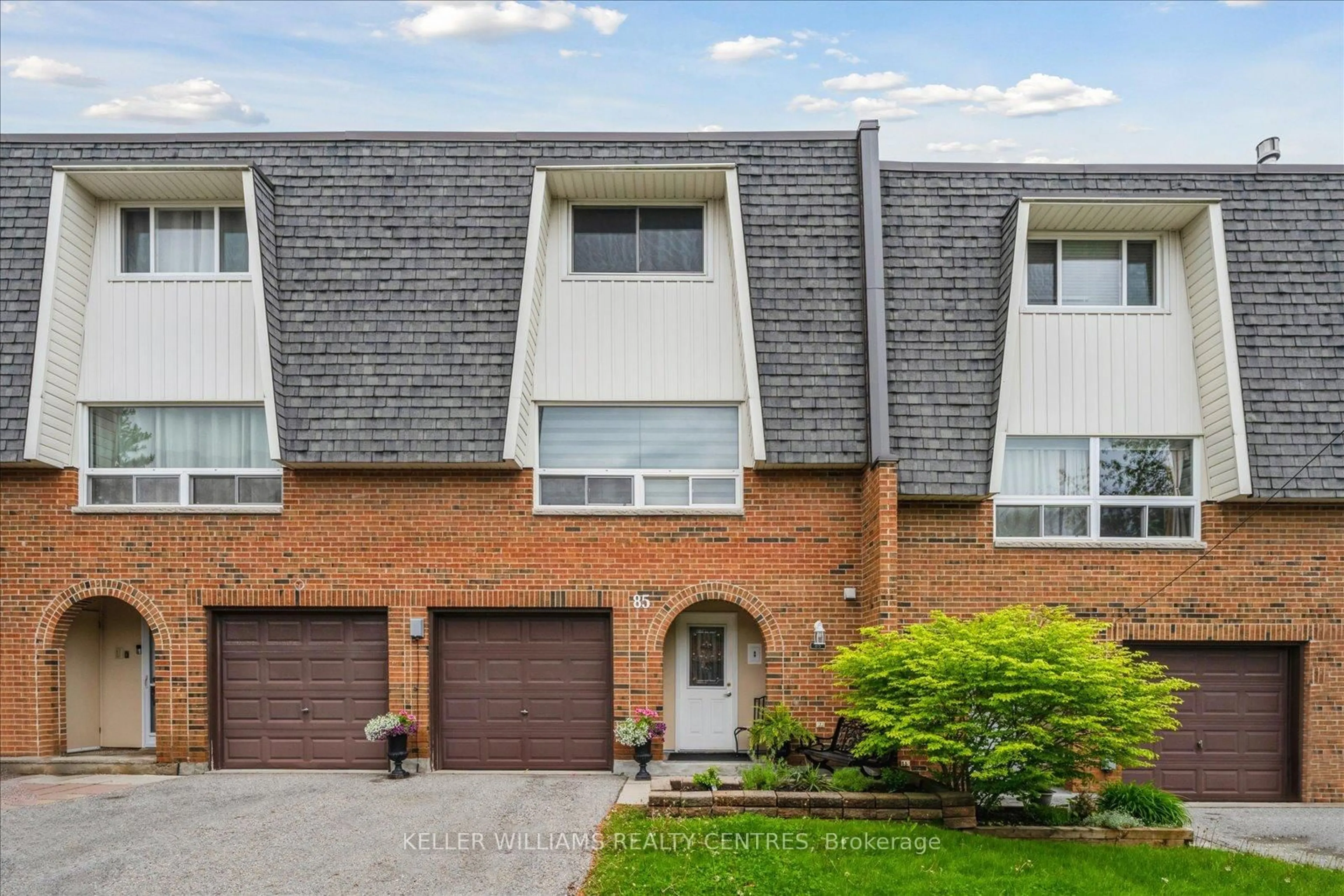 Home with brick exterior material, street for 85 Deacon Lane #85, Ajax Ontario L1S 2T4