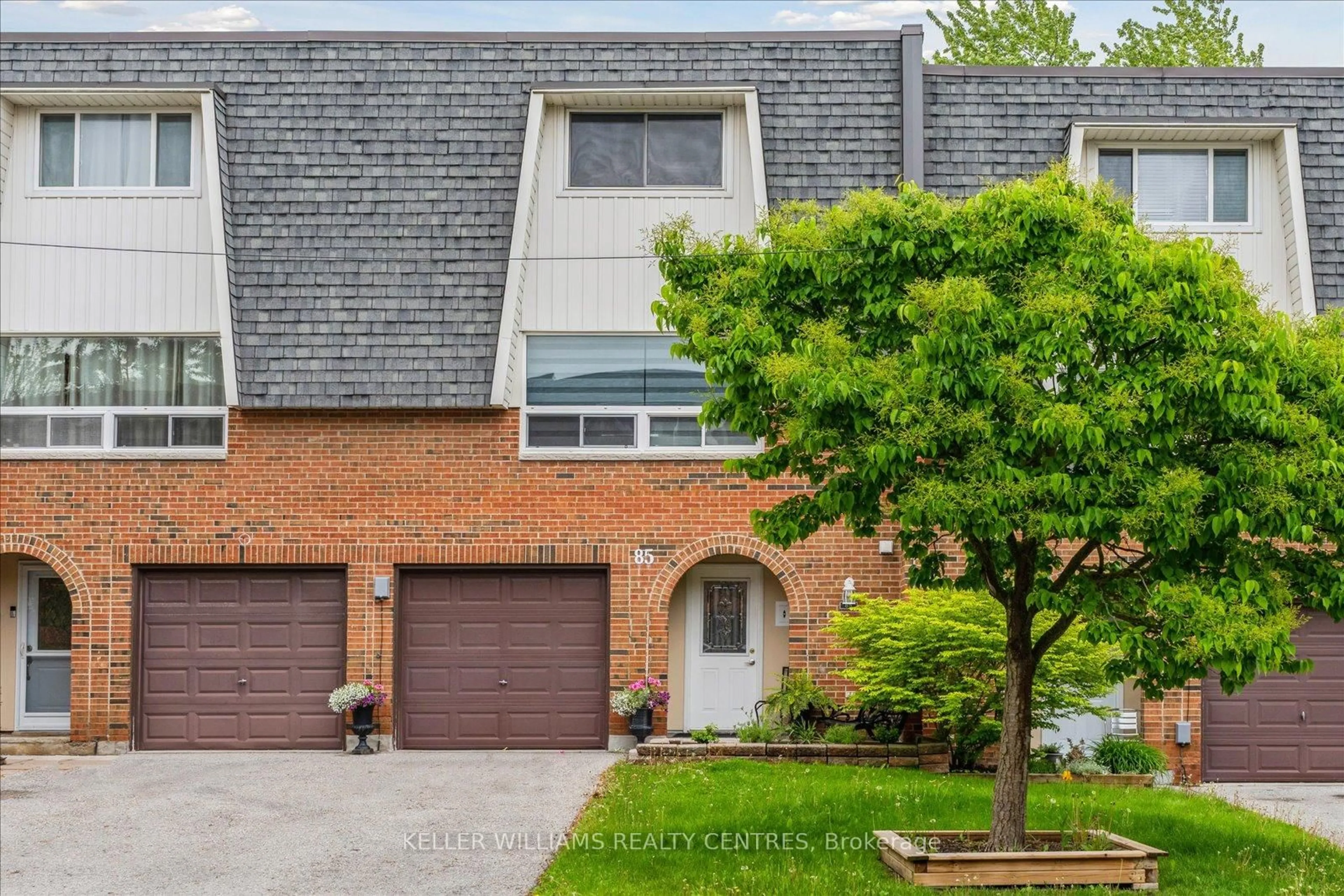 Home with brick exterior material, street for 85 Deacon Lane #85, Ajax Ontario L1S 2T4