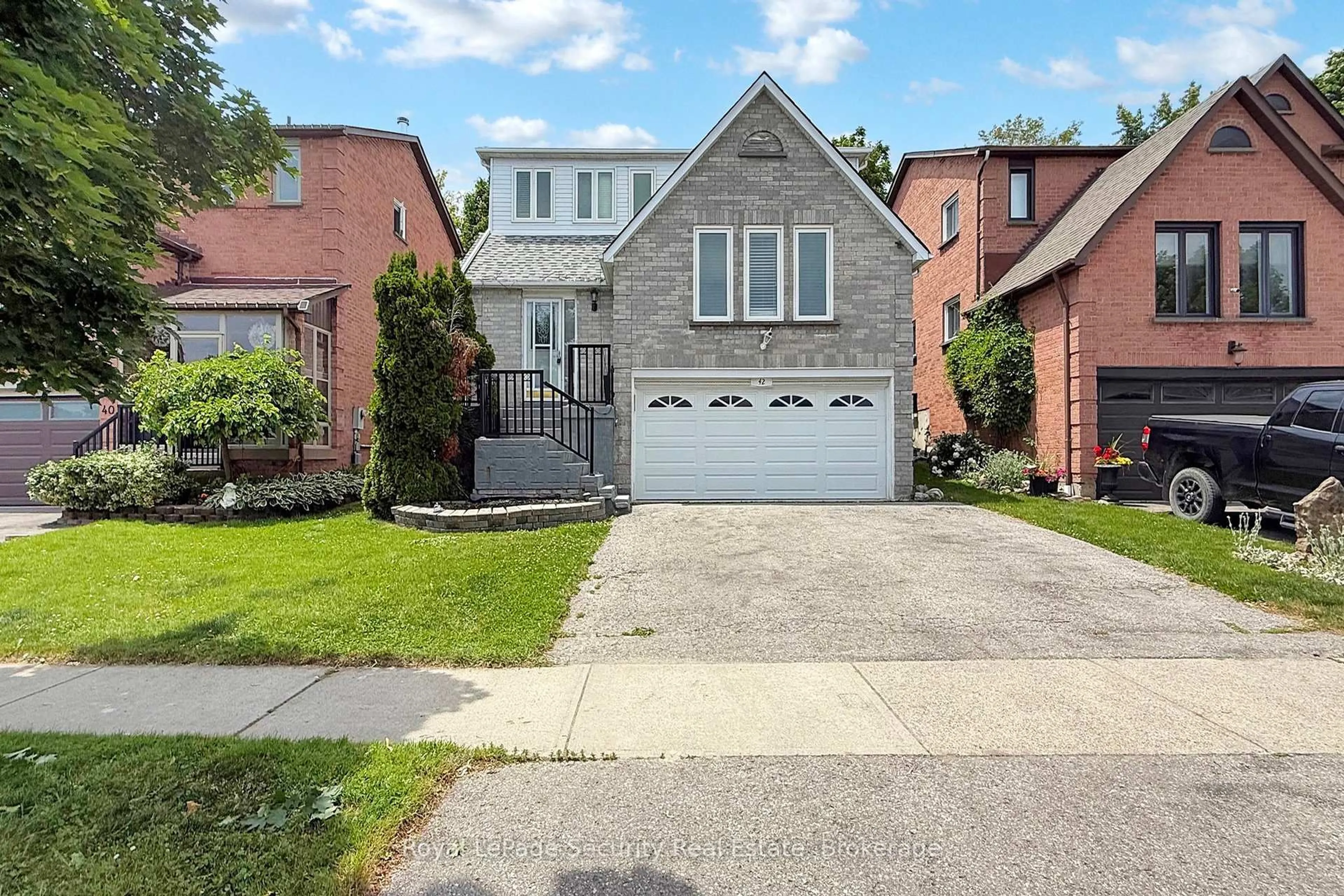 Home with brick exterior material, street for 42 Gardiner Dr, Ajax Ontario L1S 5Y3
