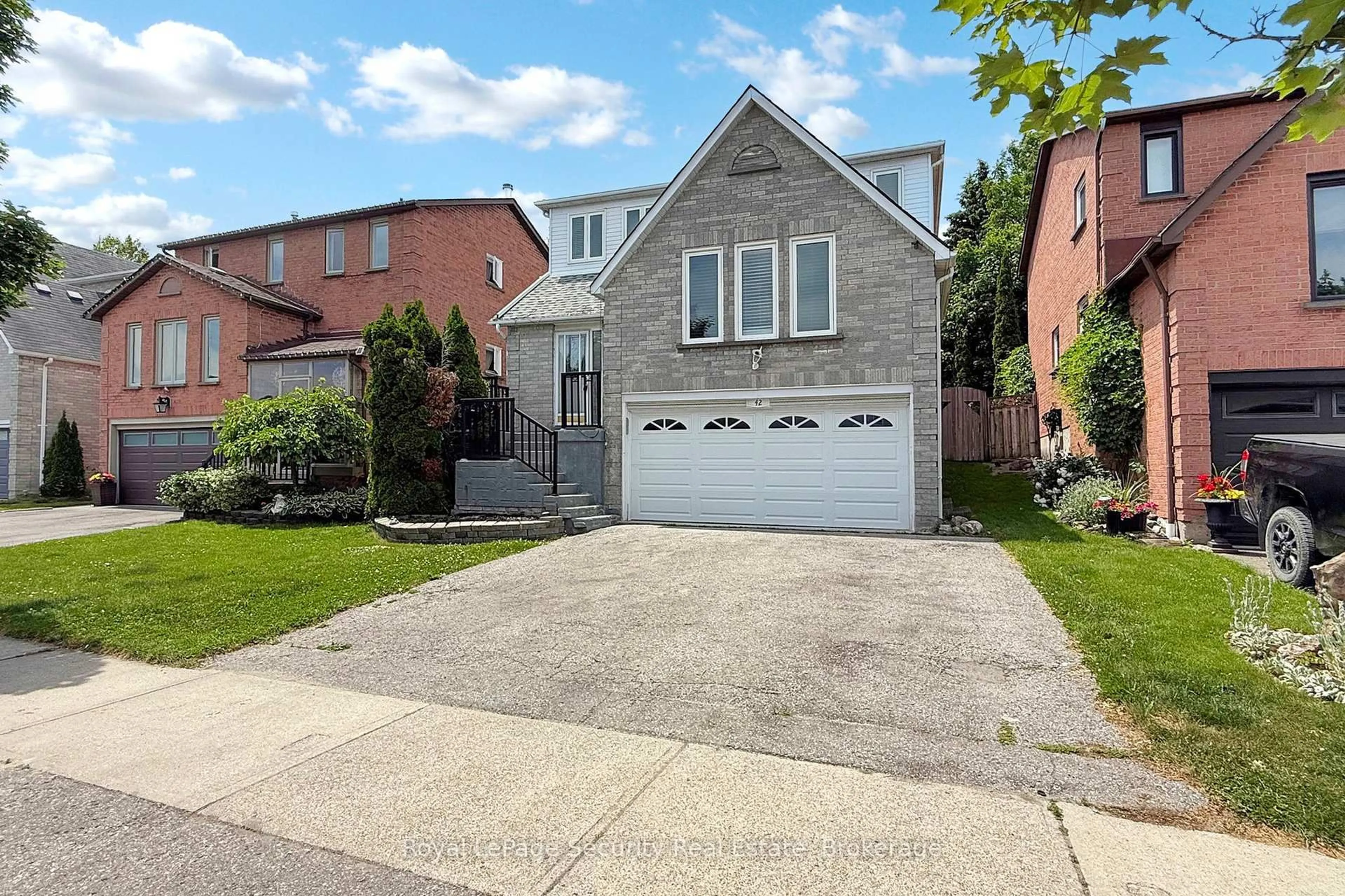 Home with brick exterior material, street for 42 Gardiner Dr, Ajax Ontario L1S 5Y3