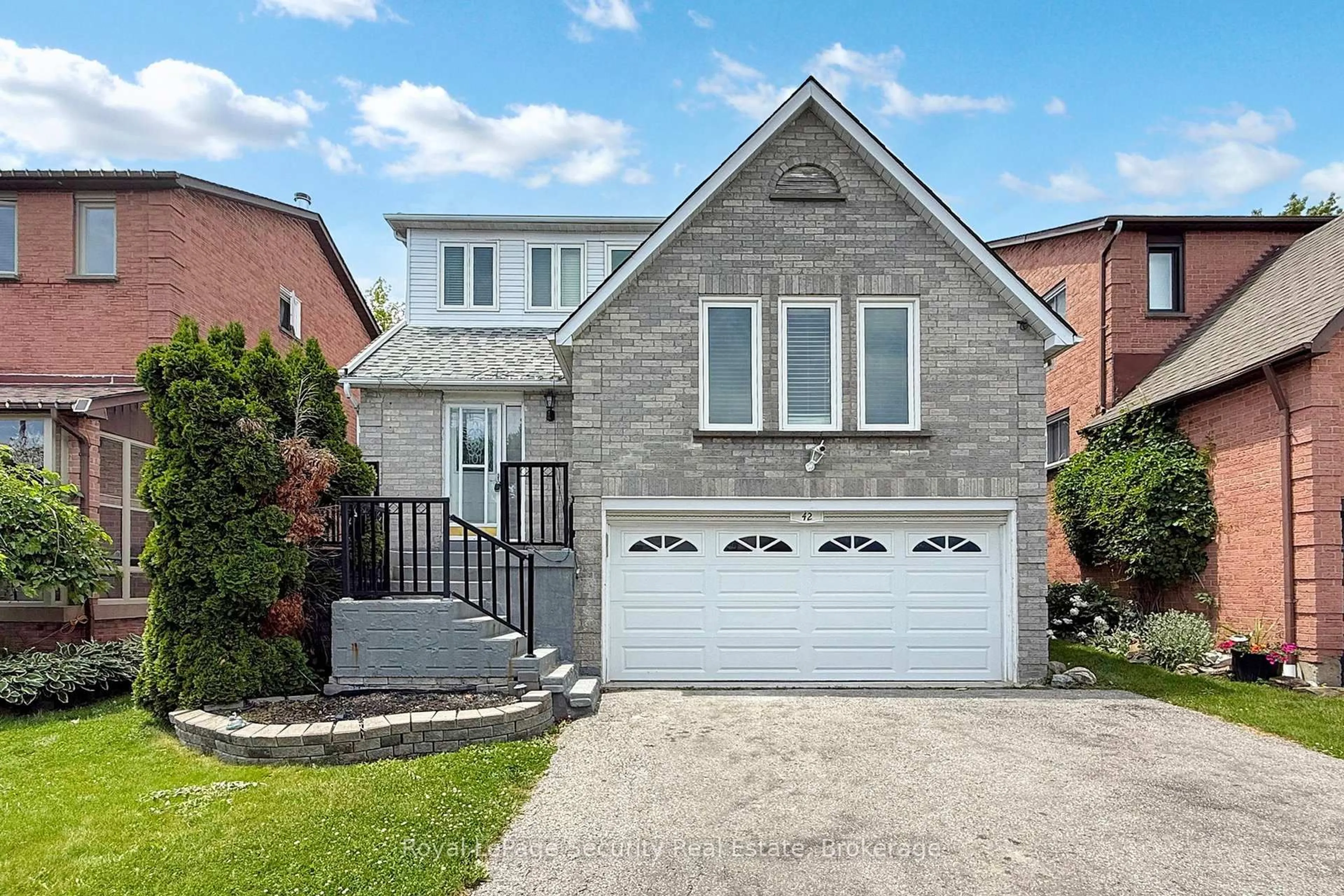 Home with brick exterior material, street for 42 Gardiner Dr, Ajax Ontario L1S 5Y3