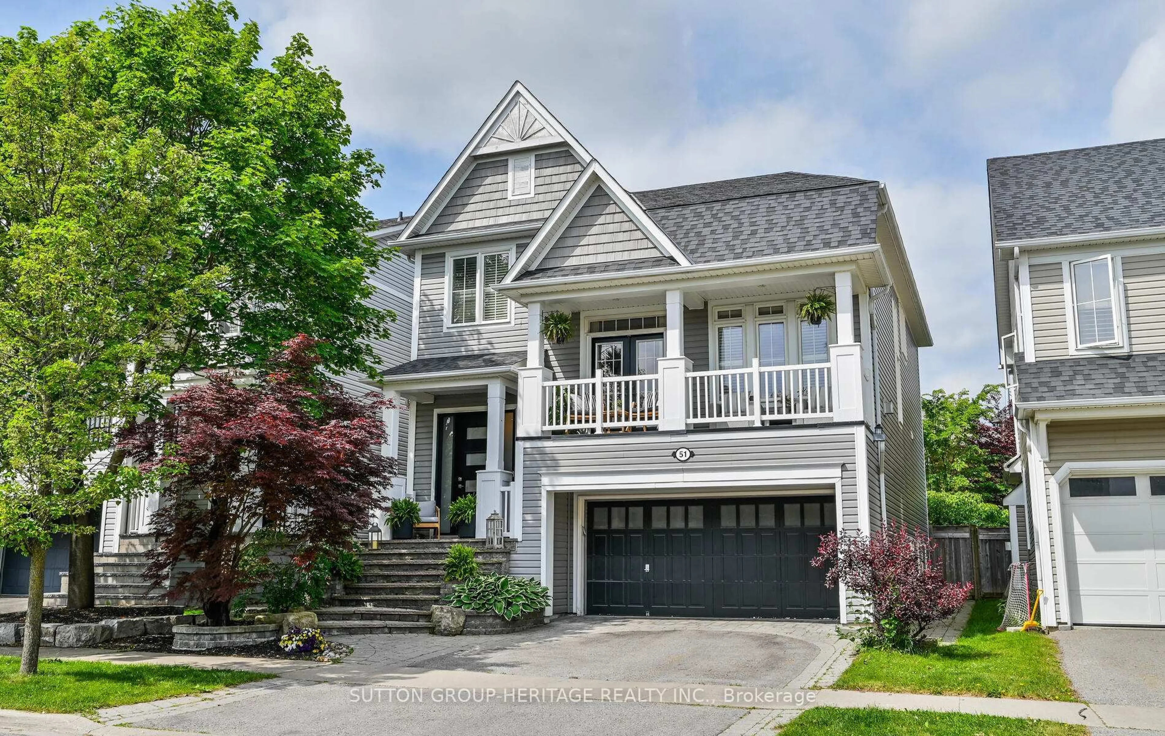 Home with vinyl exterior material, street for 51 Strandmore Circ, Whitby Ontario L1M 0B9