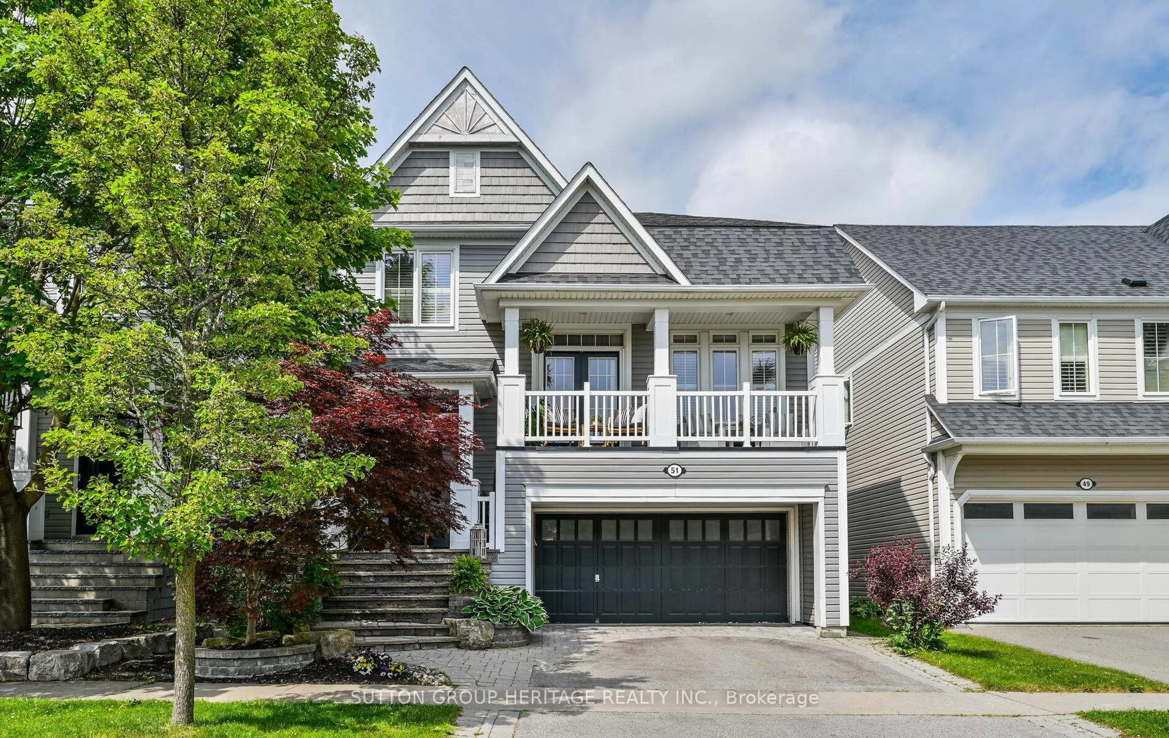Home with vinyl exterior material, street for 51 Strandmore Circ, Whitby Ontario L1M 0B9