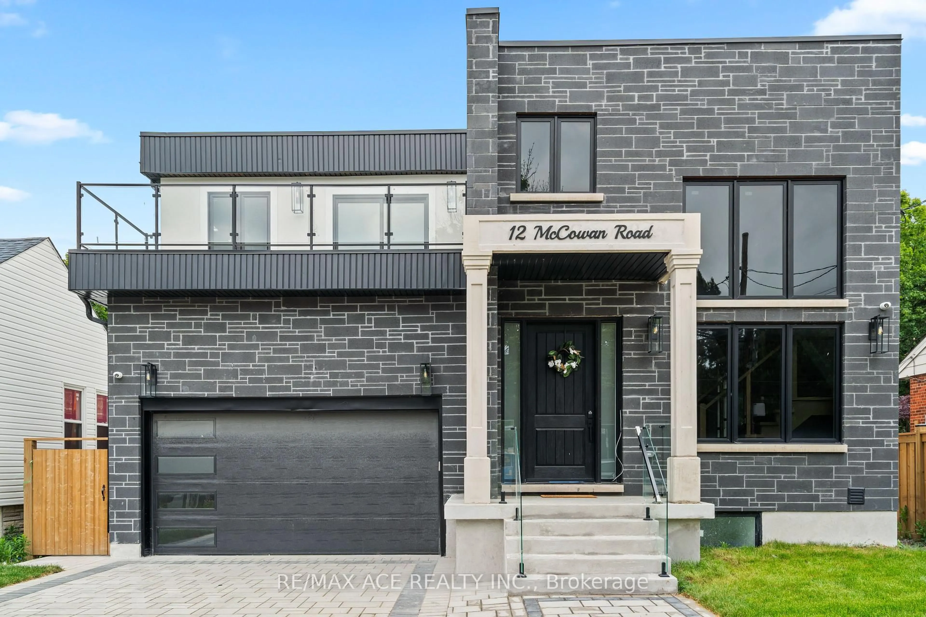Home with brick exterior material, street for 12 McCowan Rd, Toronto Ontario M1M 3L8