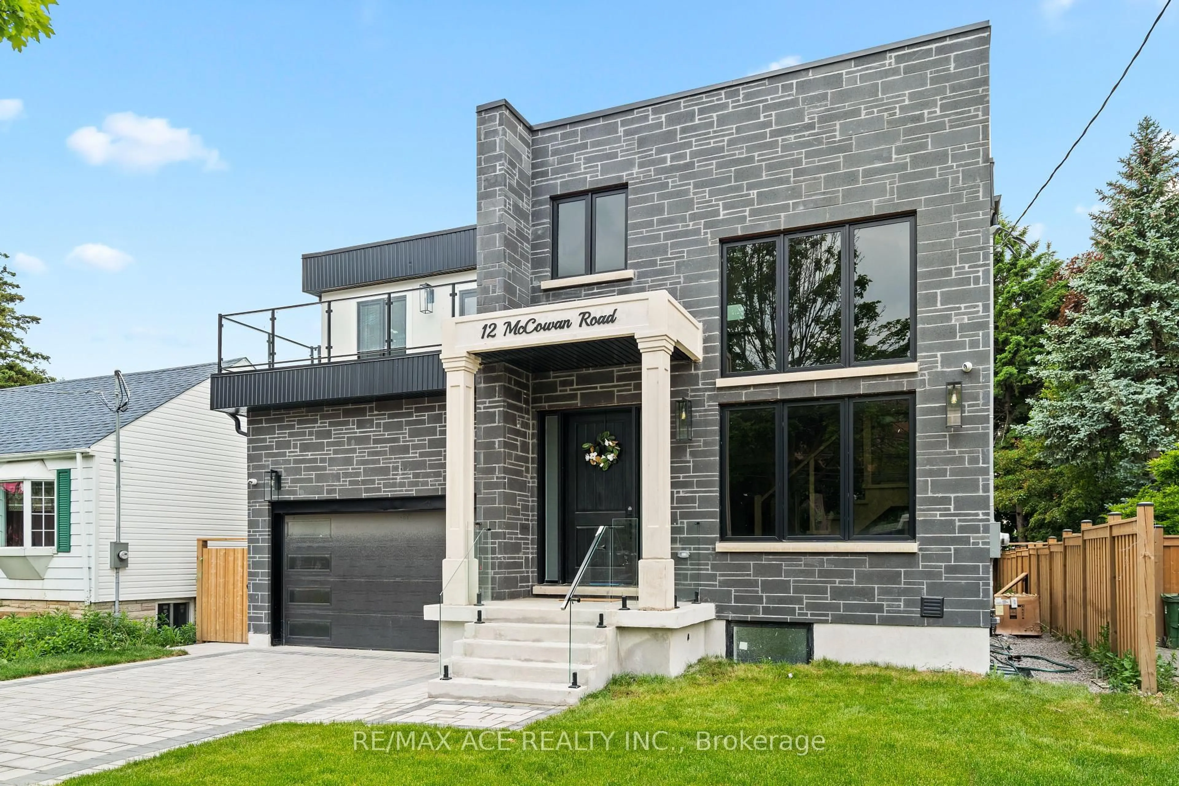 Home with brick exterior material, street for 12 McCowan Rd, Toronto Ontario M1M 3L8