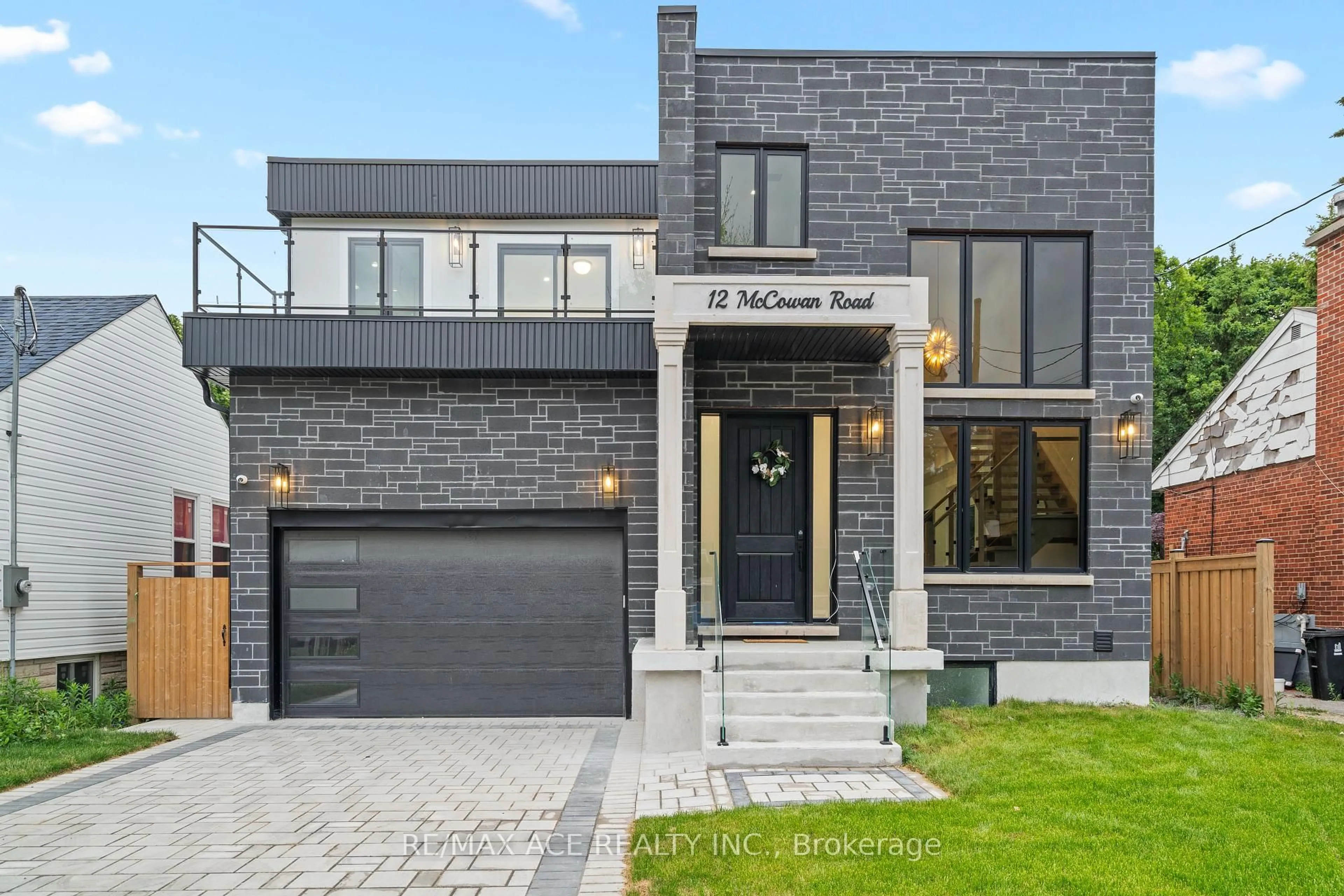 Home with brick exterior material, street for 12 McCowan Rd, Toronto Ontario M1M 3L8