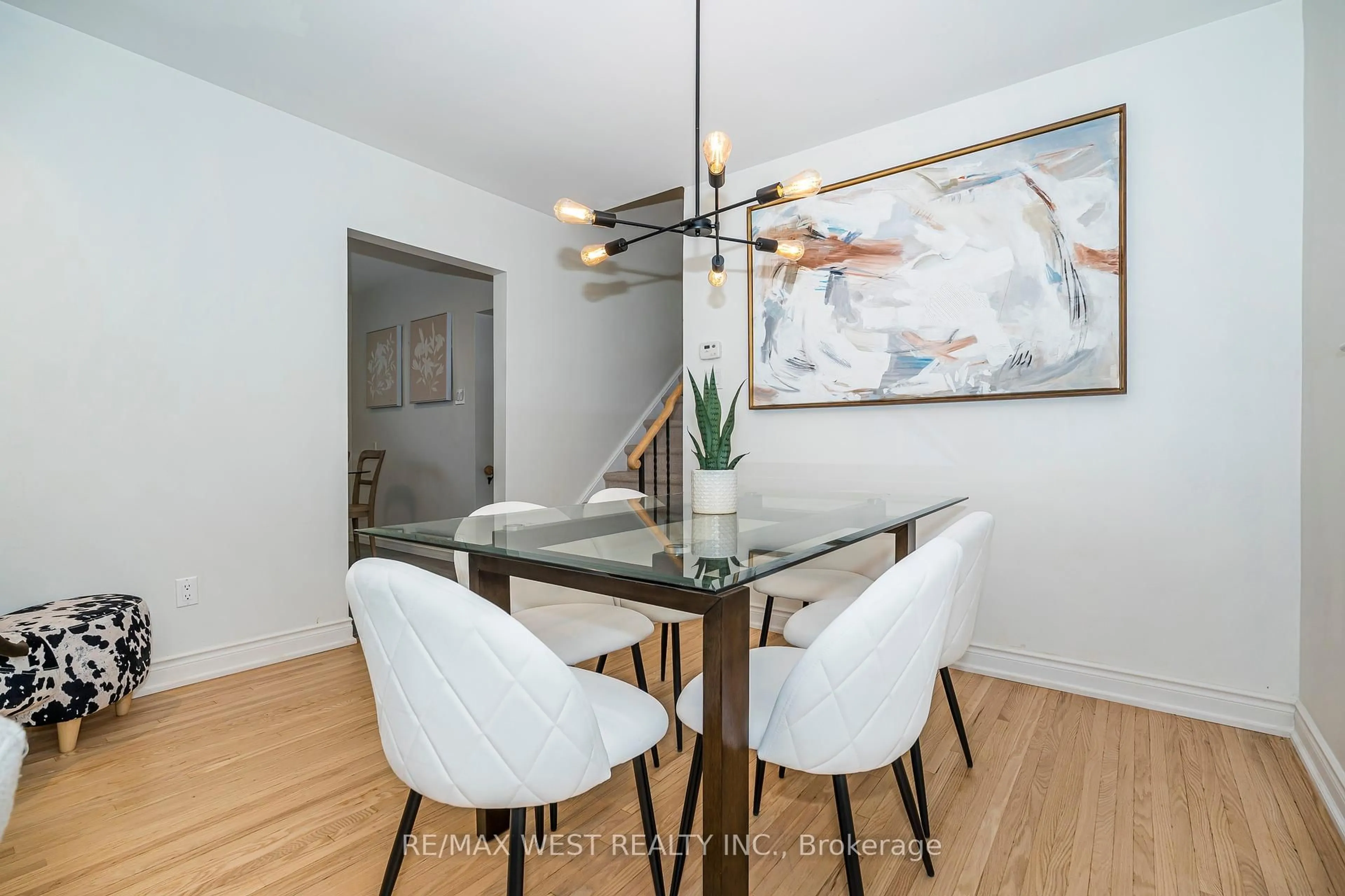 Dining room, wood/laminate floor for 57 Bledlow Manor Dr, Toronto Ontario M1E 1B1