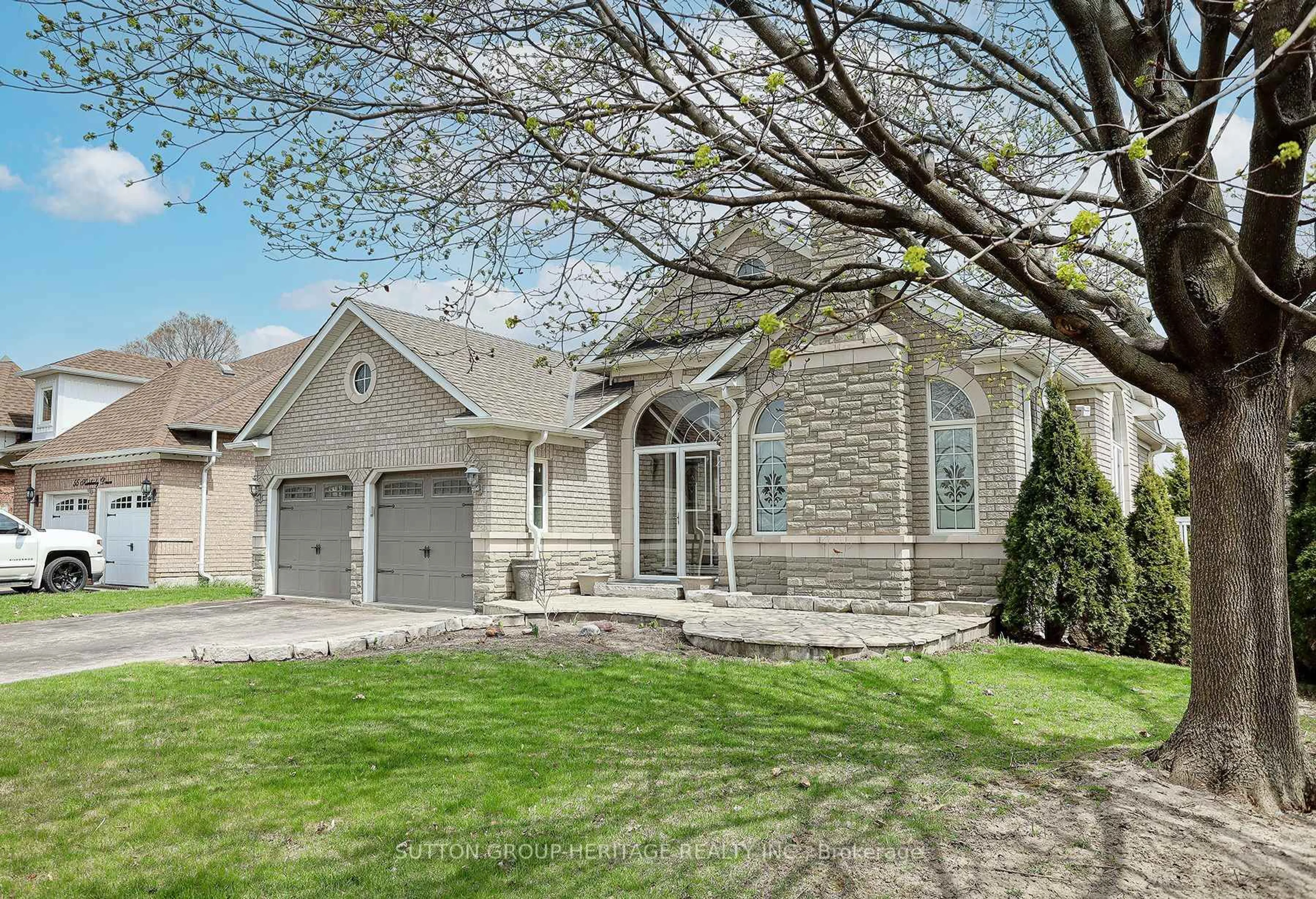Home with brick exterior material, street for 57 Kimberly Dr, Whitby Ontario L1M 1K5