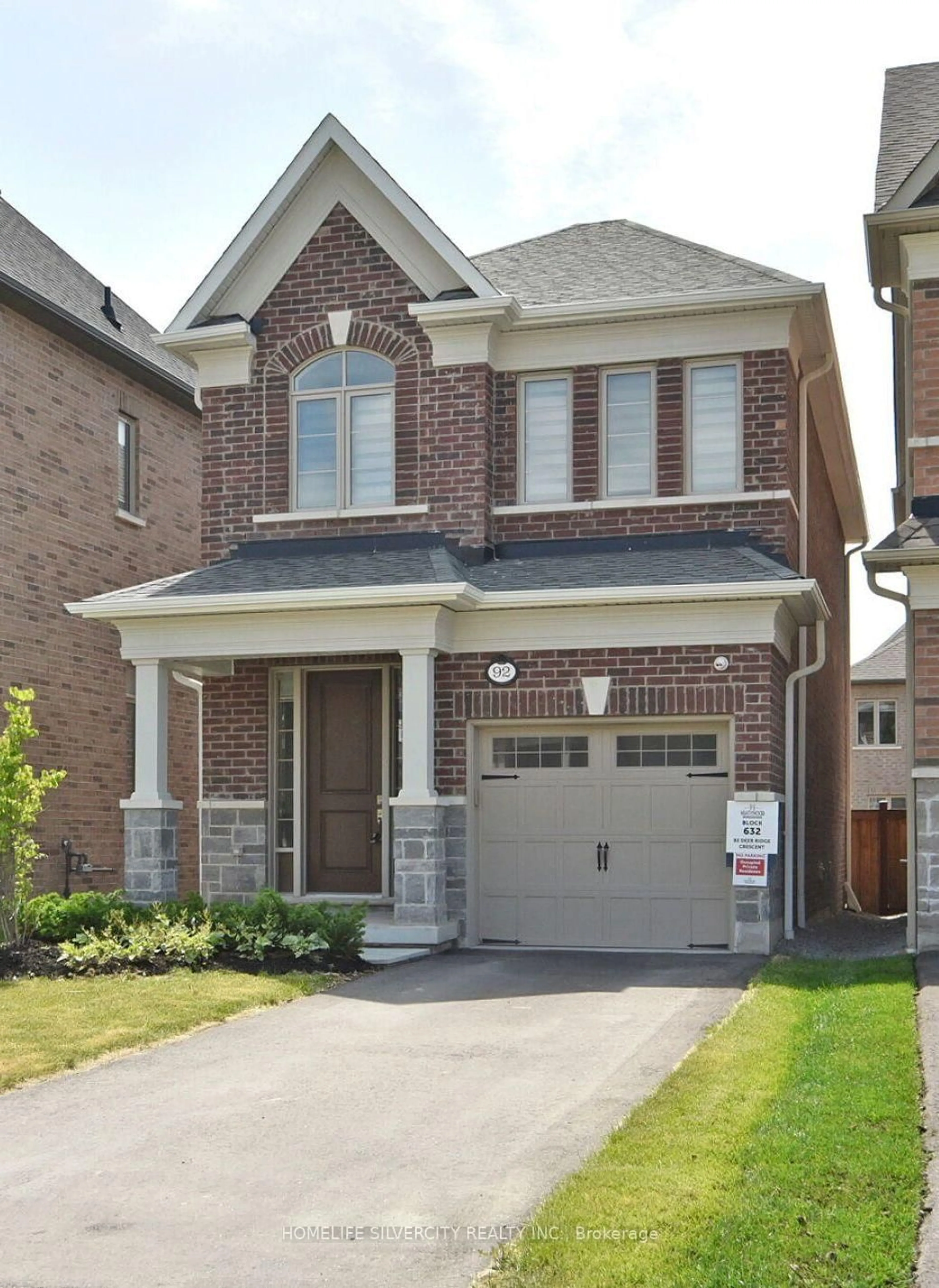 Home with brick exterior material, street for 92 Deer Ridge Cres, Whitby Ontario L1P 0P2