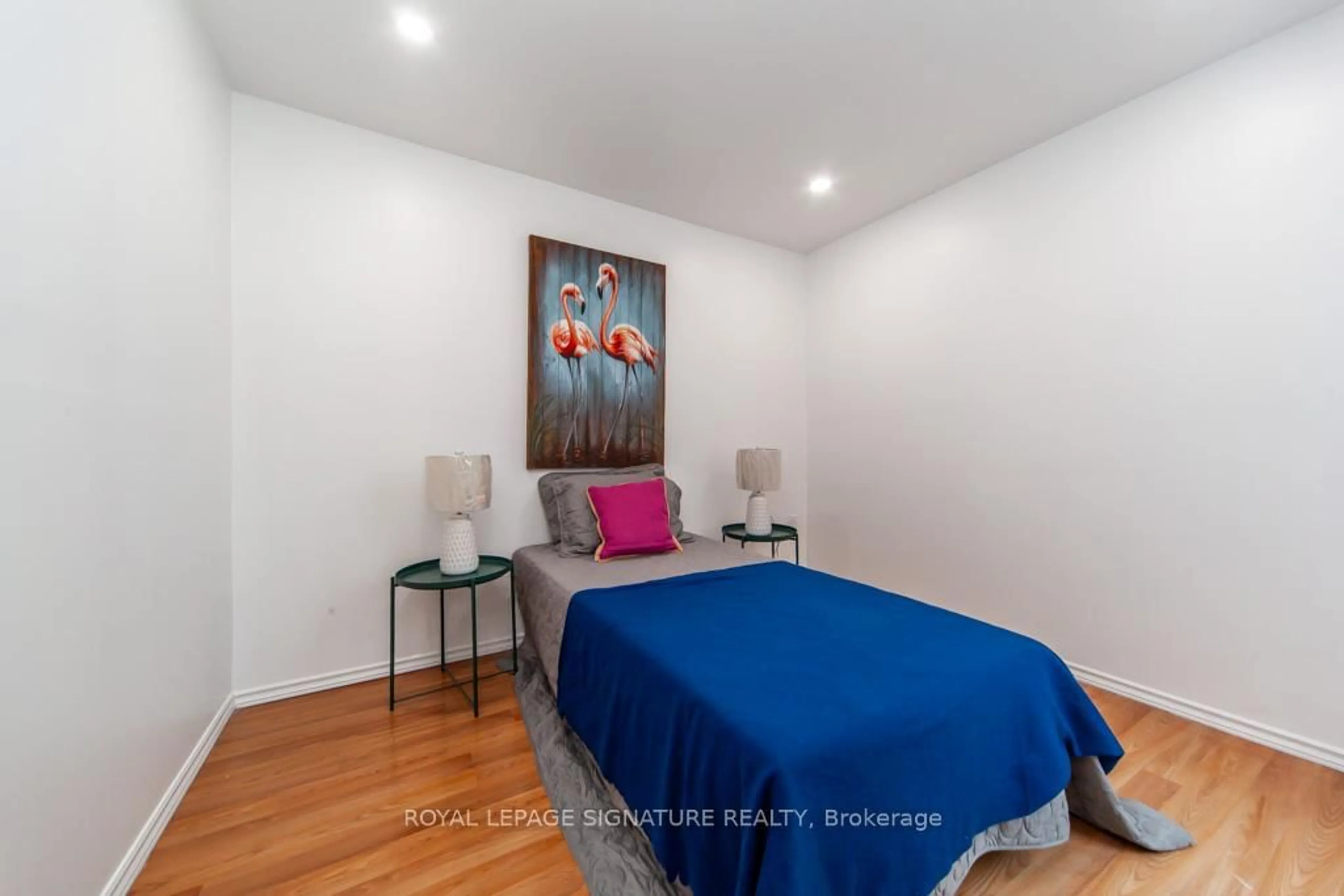 Bedroom with bed, wood/laminate floor for 100 Mornelle Crt #2073, Toronto Ontario M1E 4X2