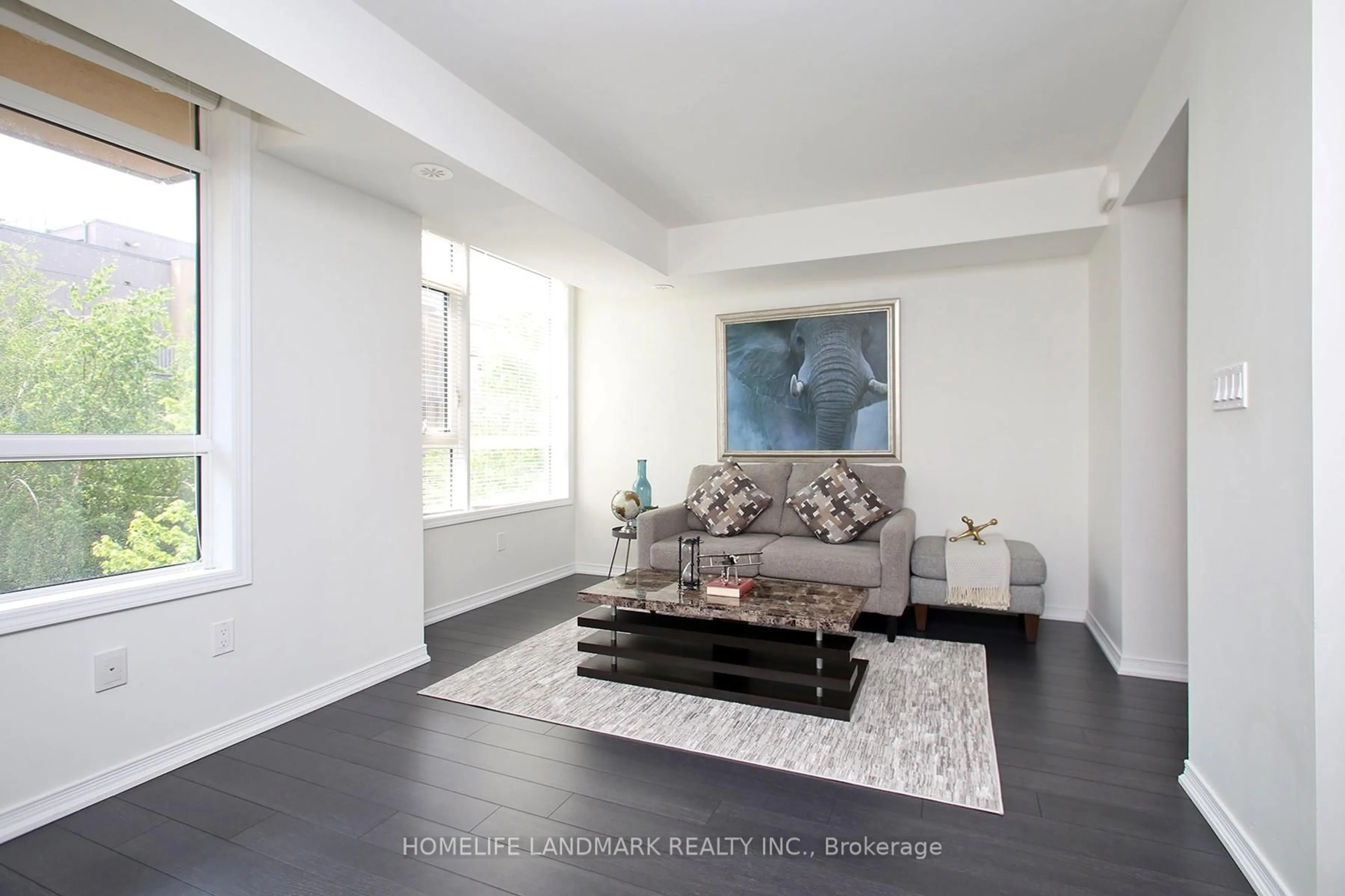 Living room with furniture, unknown for 90 Orchid Pl #304, Toronto Ontario M1B 0C4