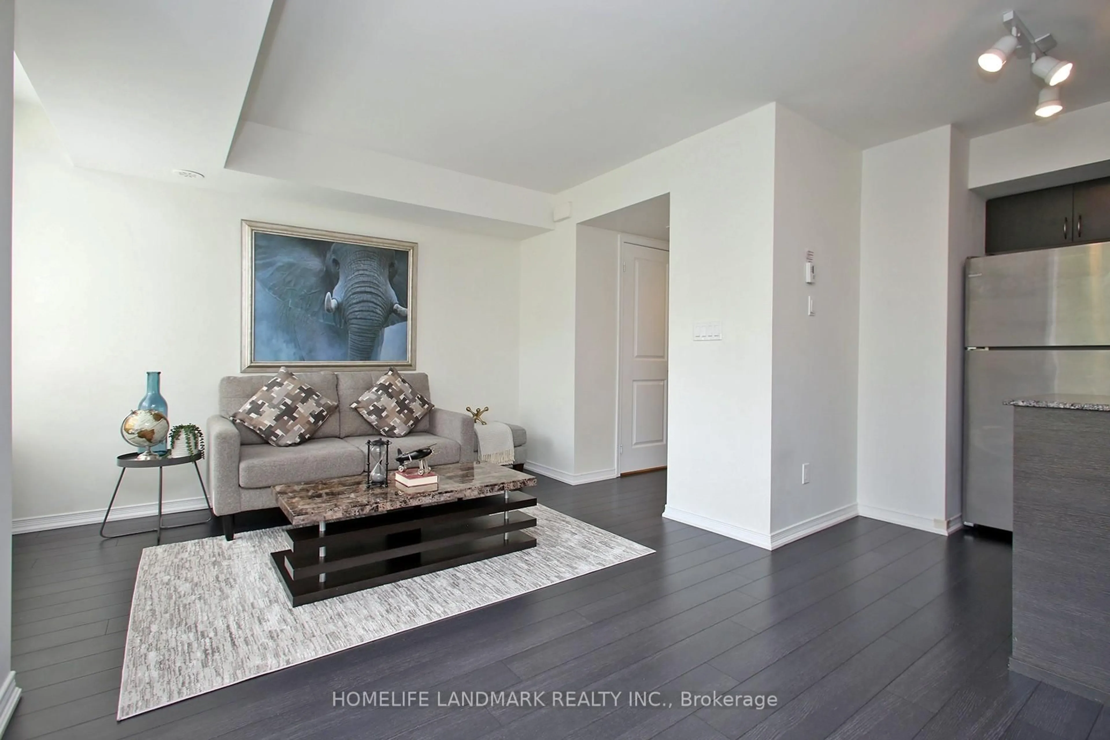 Living room with furniture, unknown for 90 Orchid Pl #304, Toronto Ontario M1B 0C4