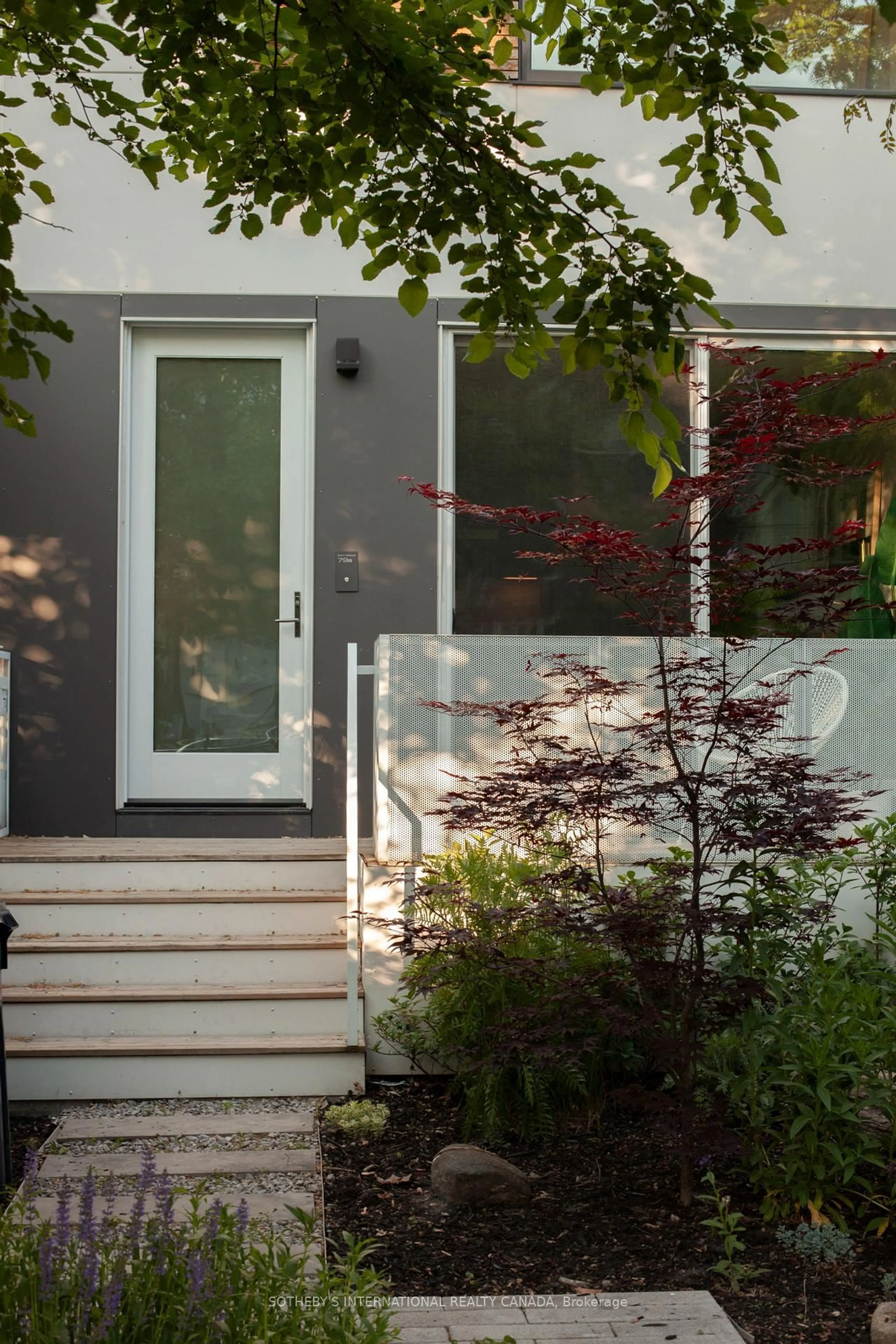 Home with vinyl exterior material, street for 79 Eaton Ave #1, Toronto Ontario M4J 2Z4