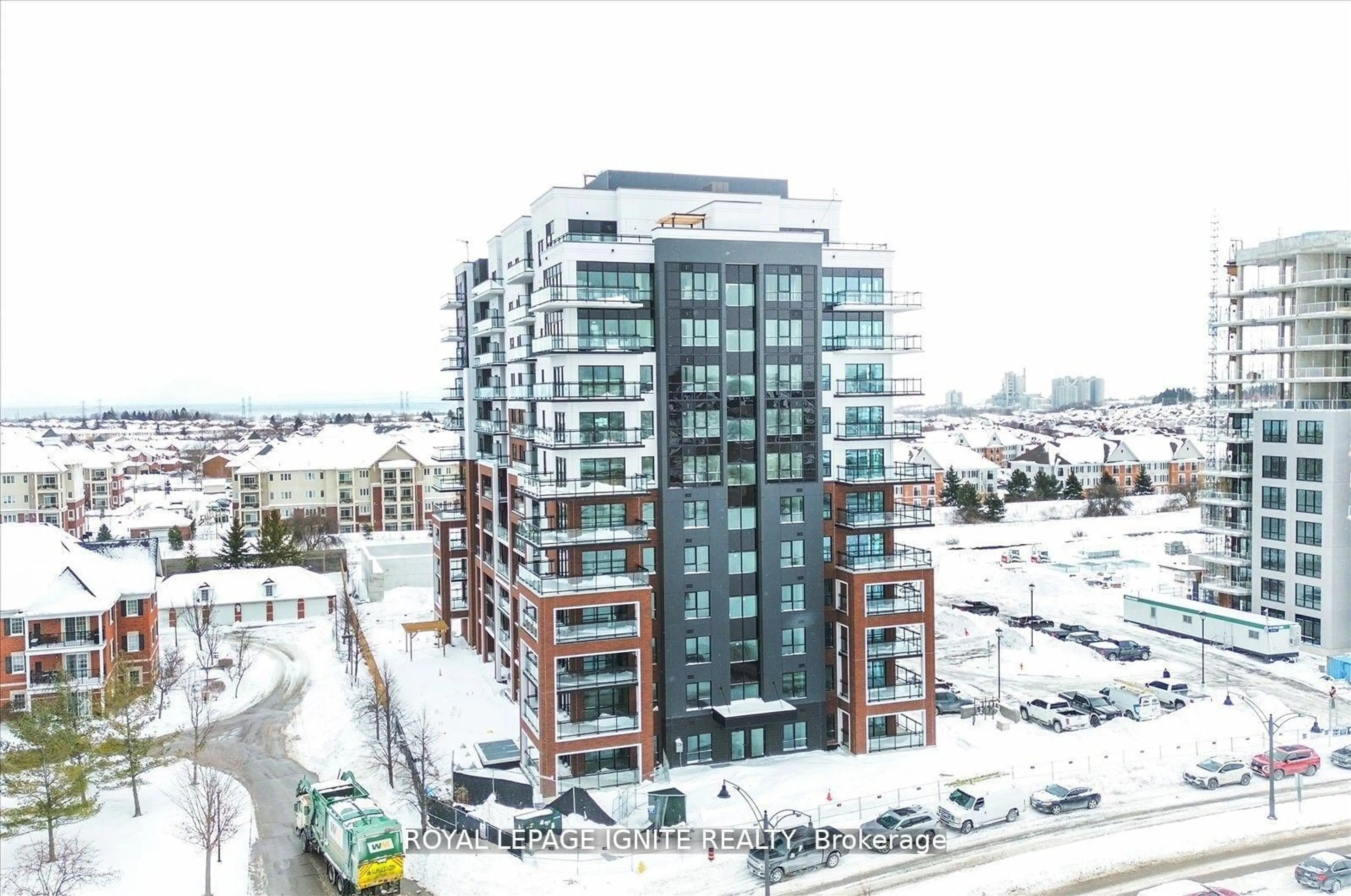 A pic from outside/outdoor area/front of a property/back of a property/a pic from drone, building for 55 Clarington Blvd #1103, Clarington Ontario L1C 7J4