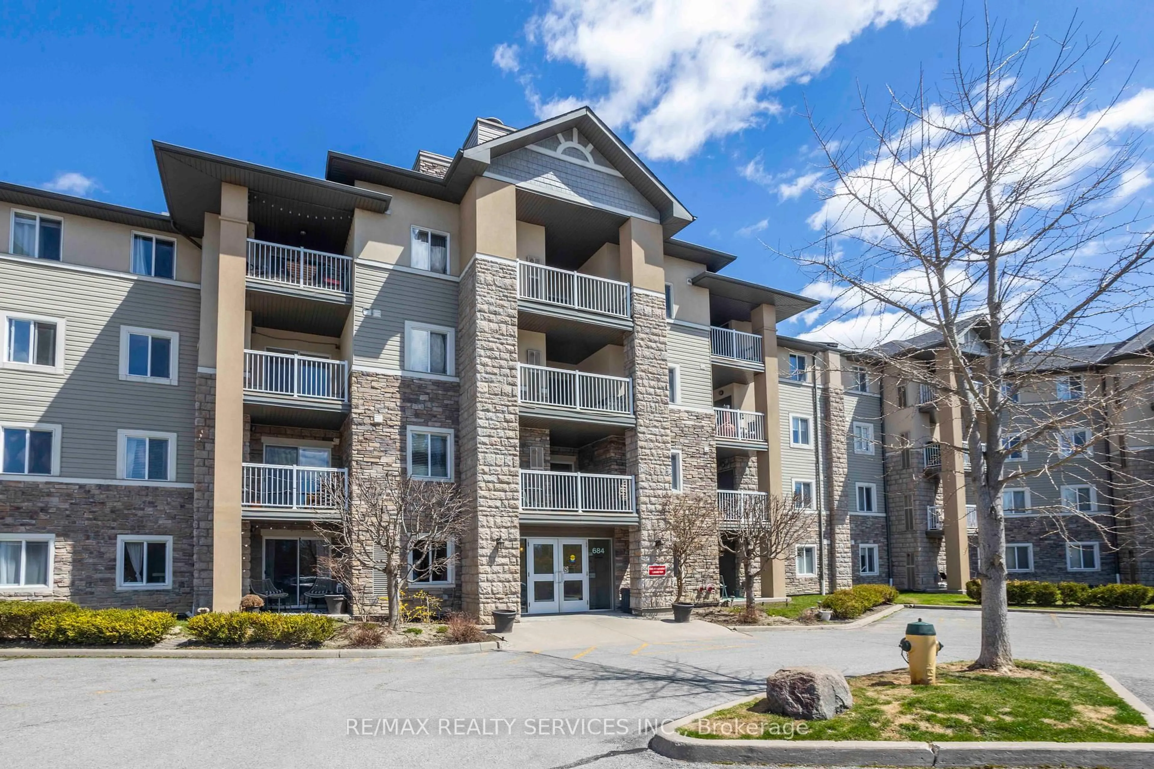 A pic from outside/outdoor area/front of a property/back of a property/a pic from drone, unknown for 684 Warden Ave #301, Toronto Ontario M1L 4W4