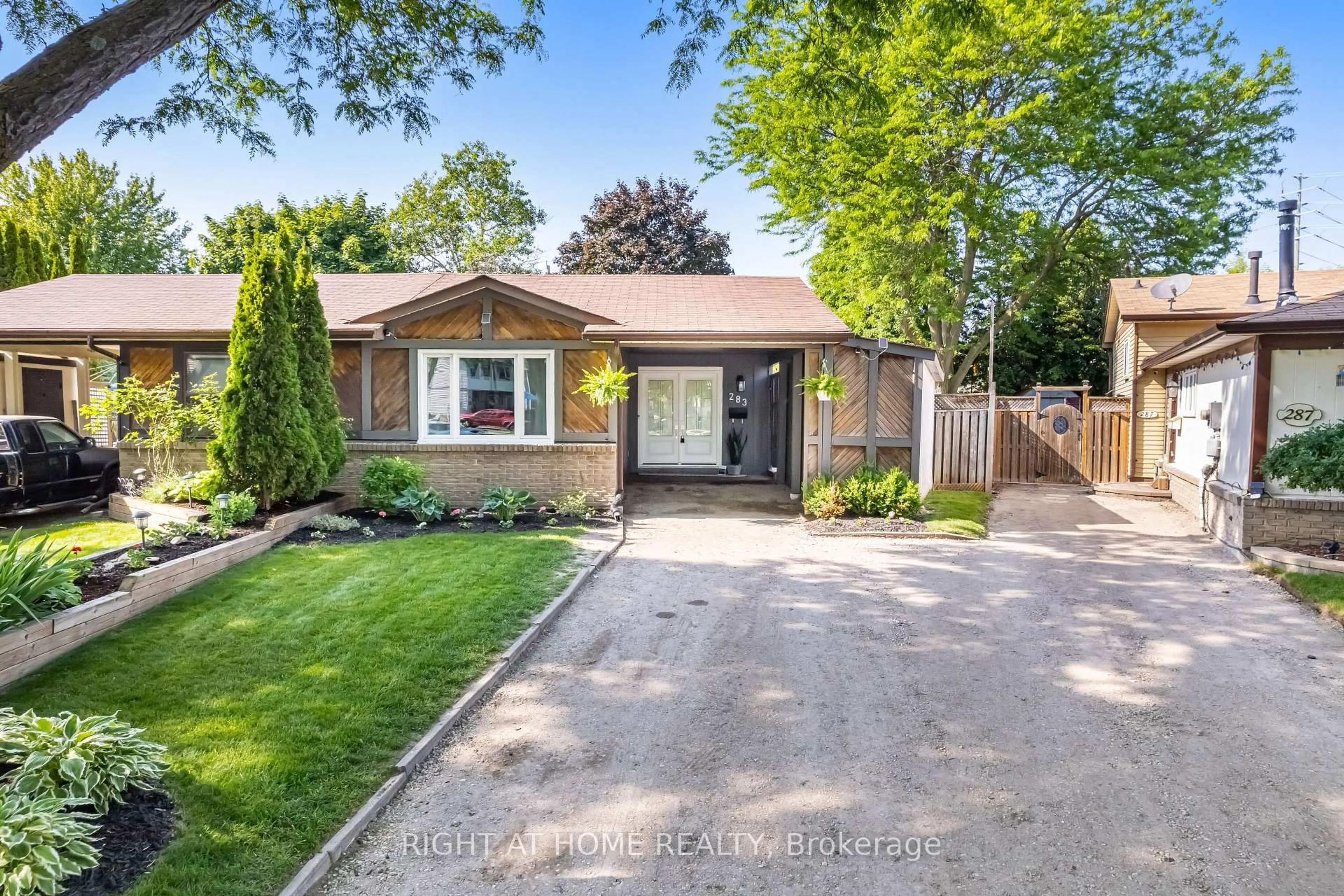 Home with brick exterior material, street for 283 Shamrock Crt, Oshawa Ontario L1J 6X9