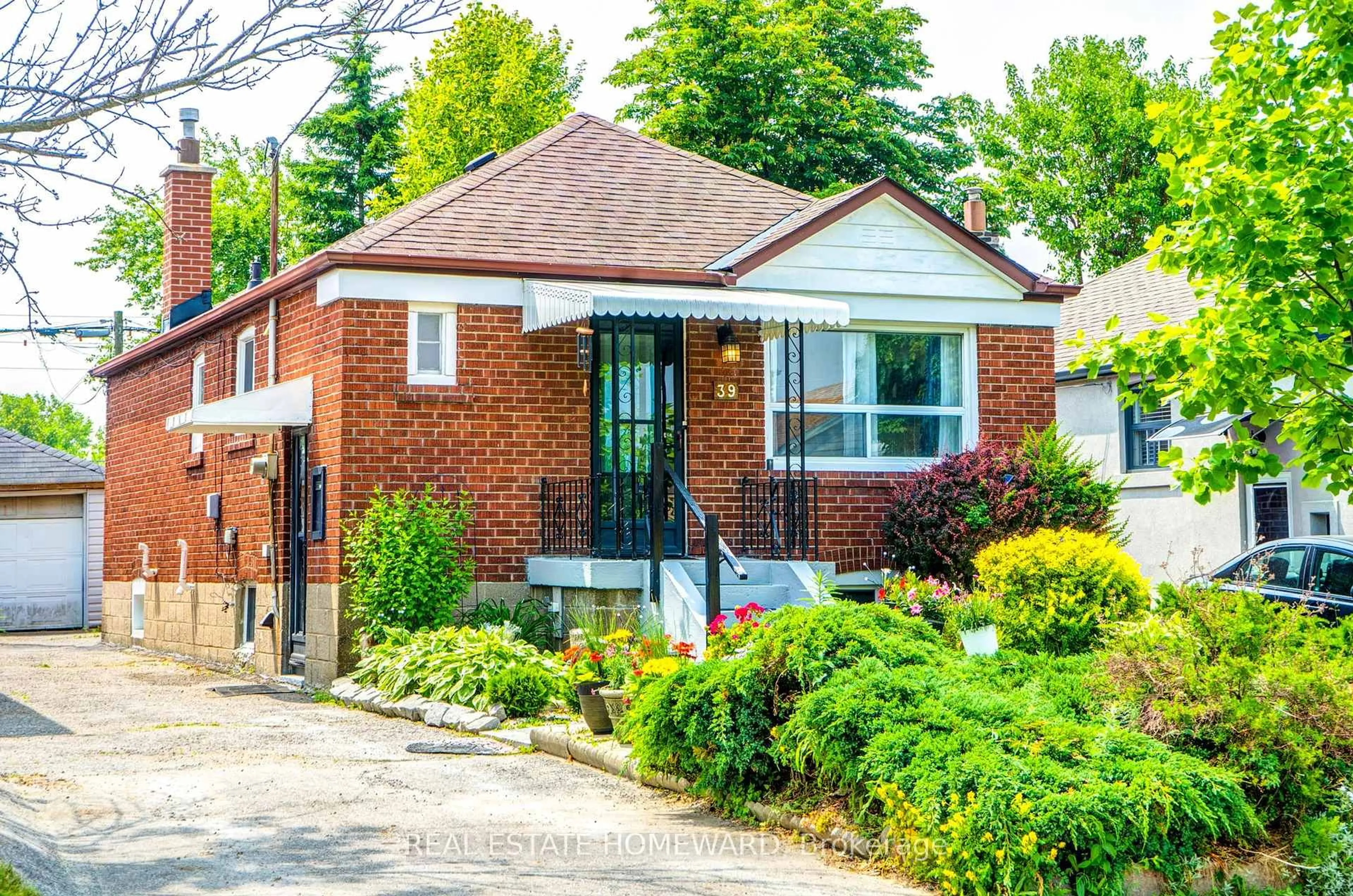Home with brick exterior material, street for 39 Galbraith Ave, Toronto Ontario M4B 2B6