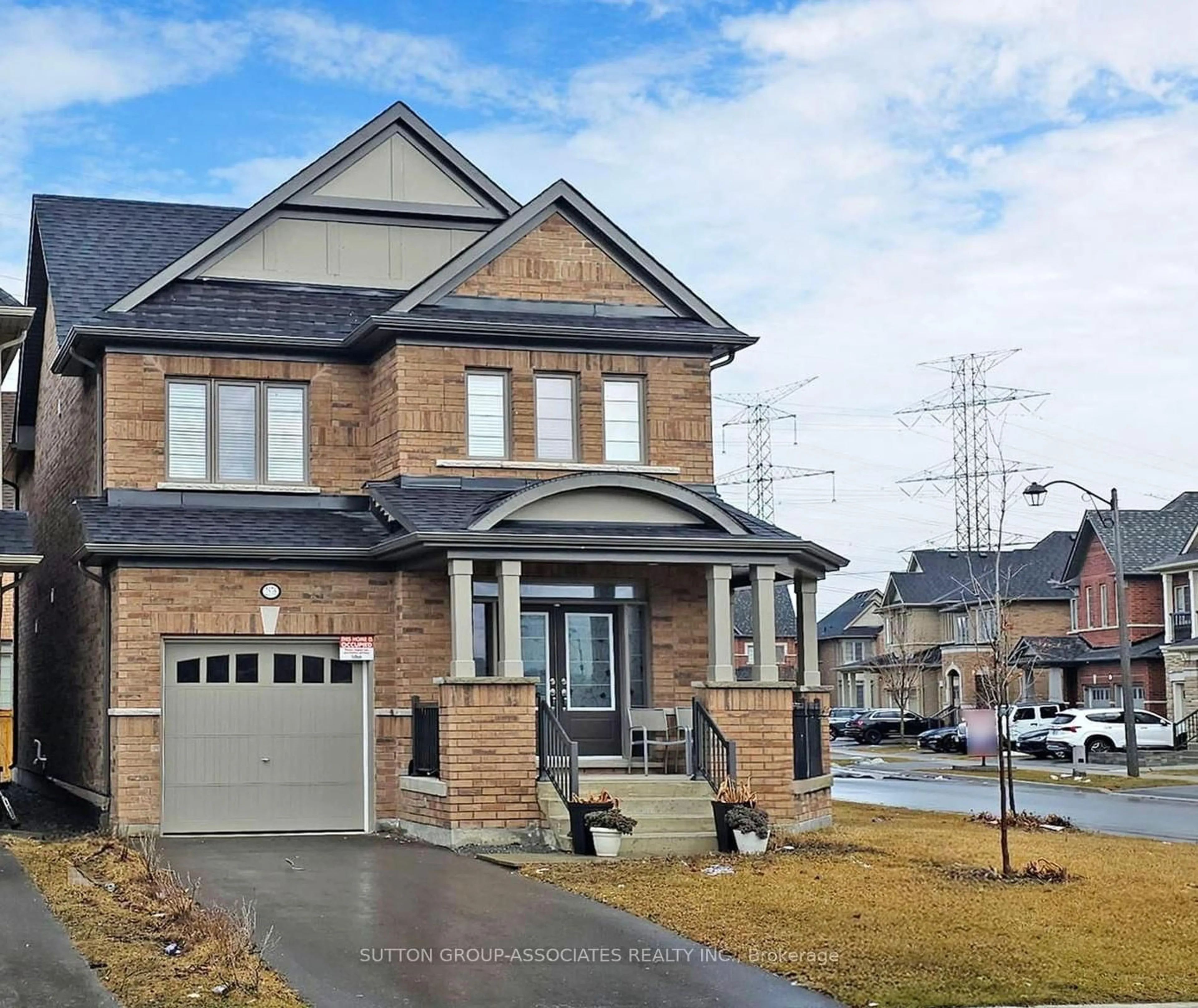 Home with brick exterior material, street for 2576 Orchestrate Dr, Oshawa Ontario L1L 0R4