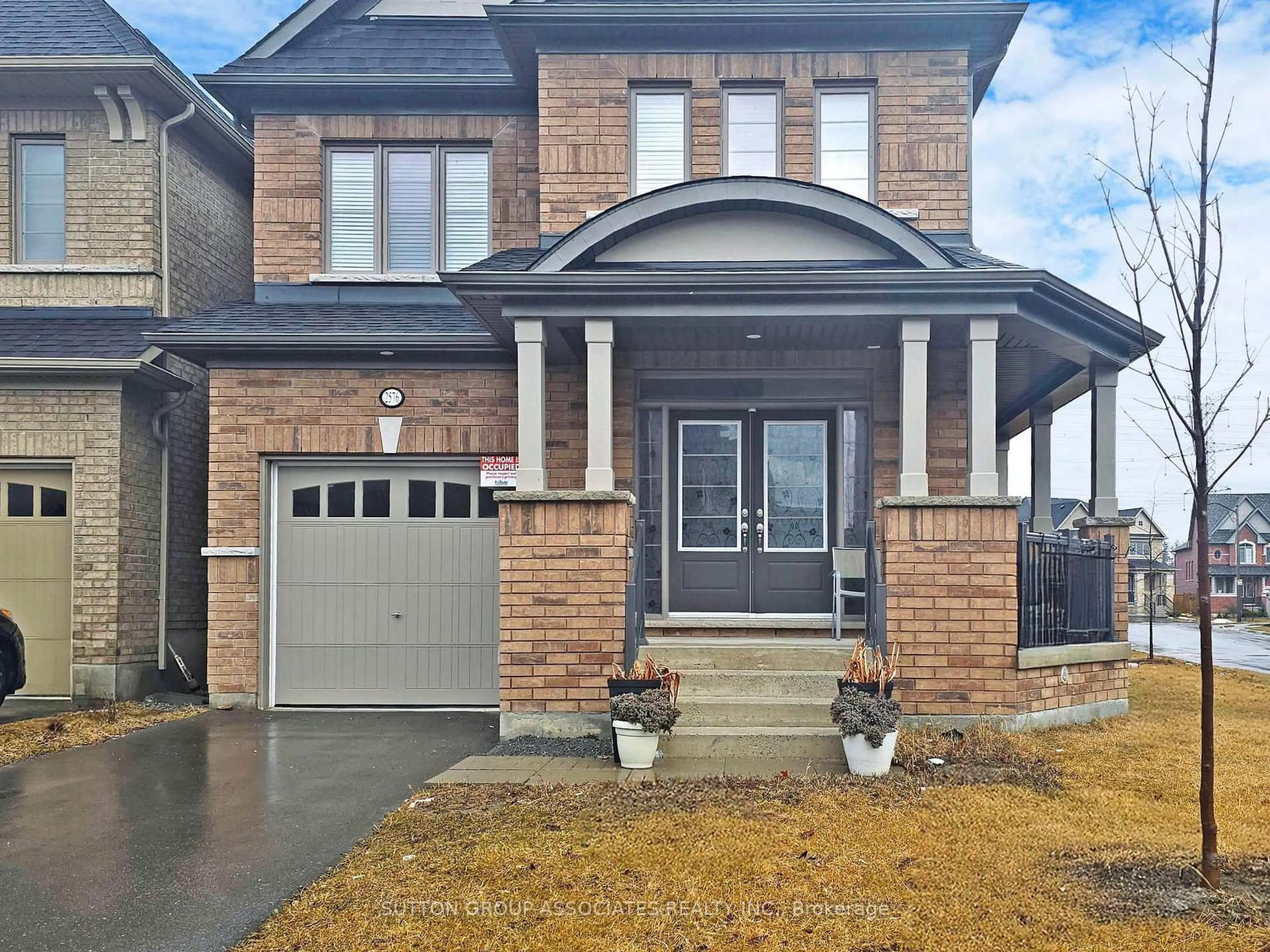 Home with brick exterior material, street for 2576 Orchestrate Dr, Oshawa Ontario L1L 0R4