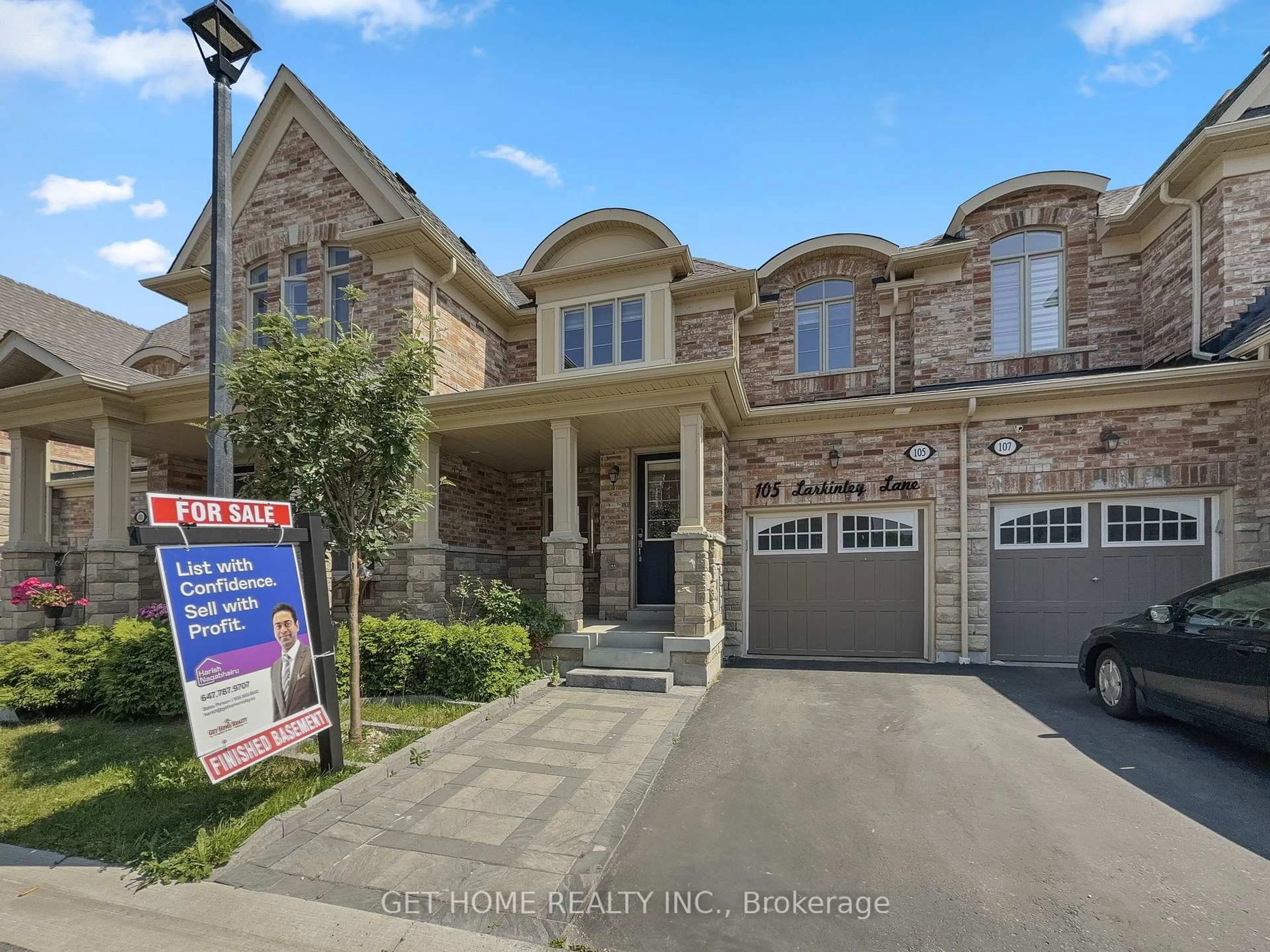 Home with brick exterior material, street for 105 Larkinley Lane, Ajax Ontario L1T 0N7