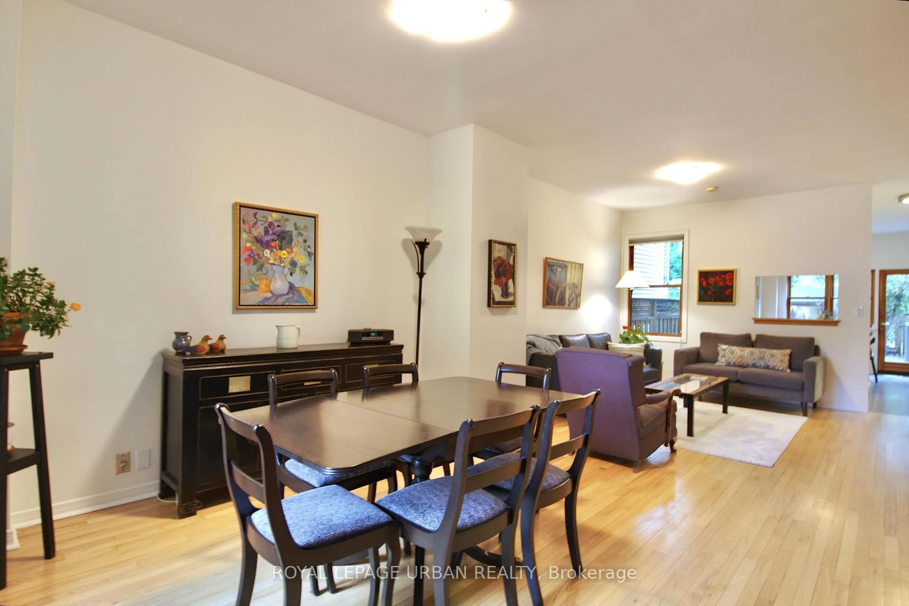 Dining room, wood/laminate floor for 277 Booth Ave, Toronto Ontario M4M 2M7