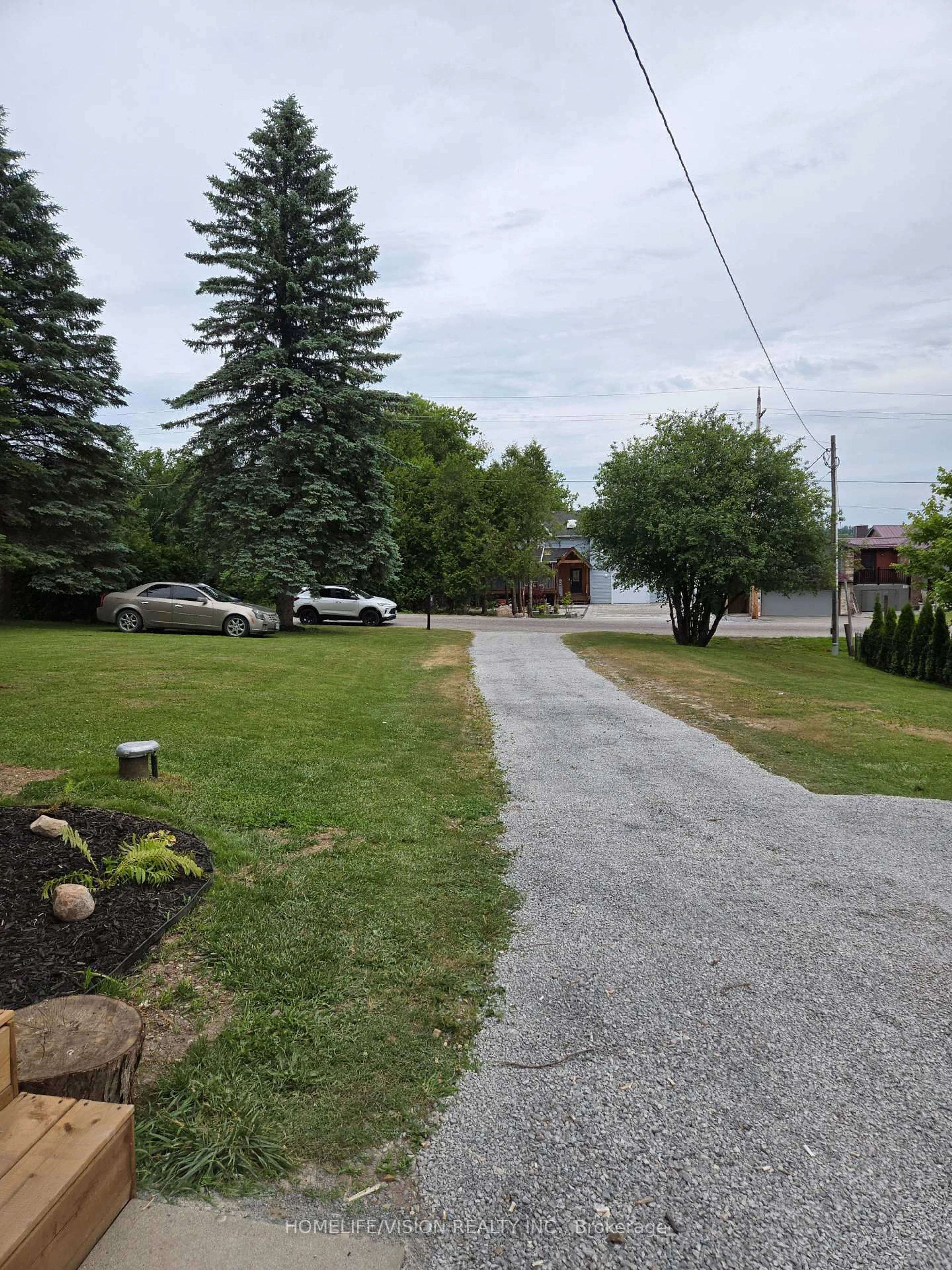 A pic from outside/outdoor area/front of a property/back of a property/a pic from drone, street for 338 Carnegie Beach Rd, Scugog Ontario L9L 1B6