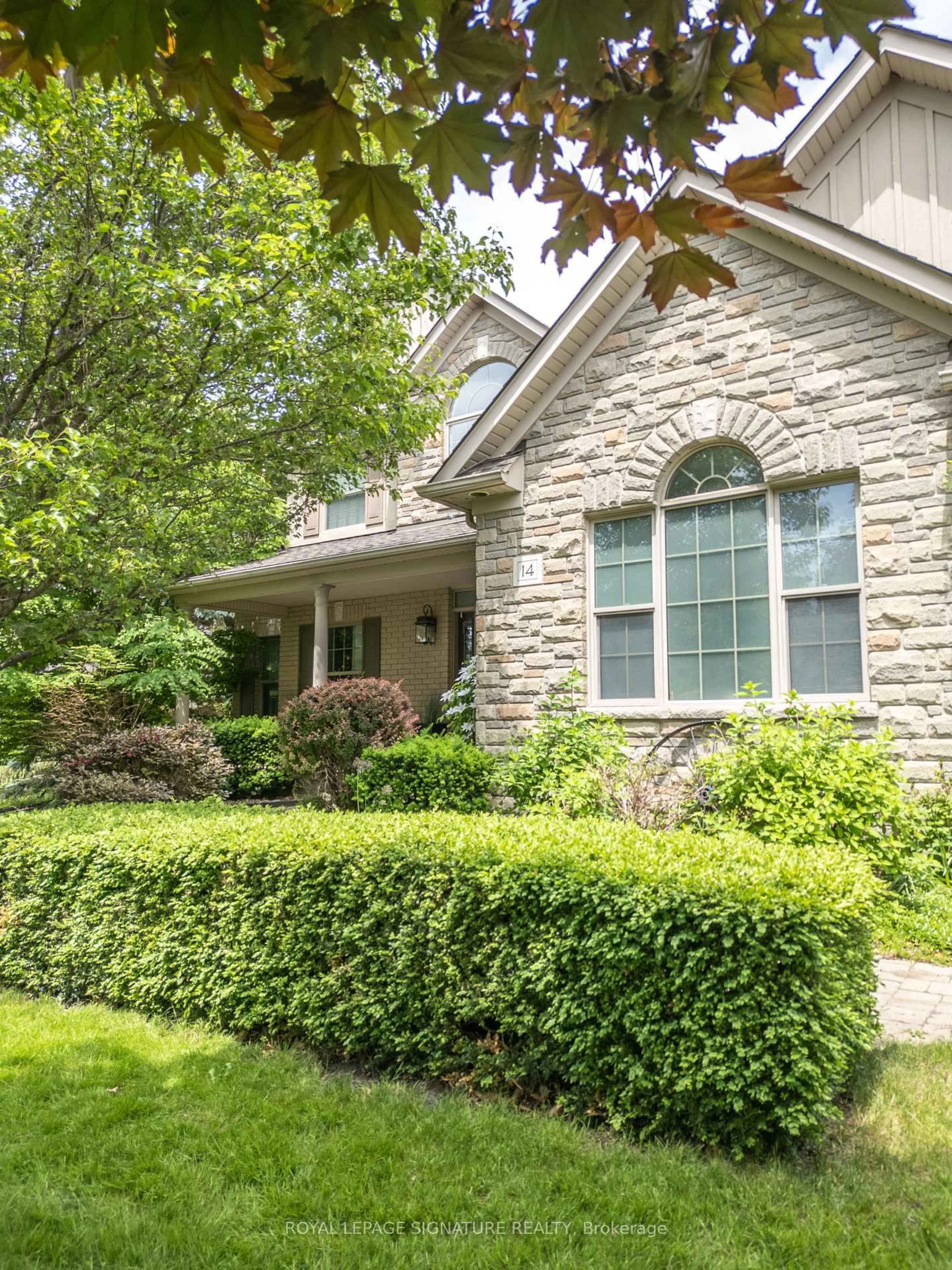 Home with brick exterior material, street for 14 Richard Butler Dr, Whitby Ontario L0B 1A0
