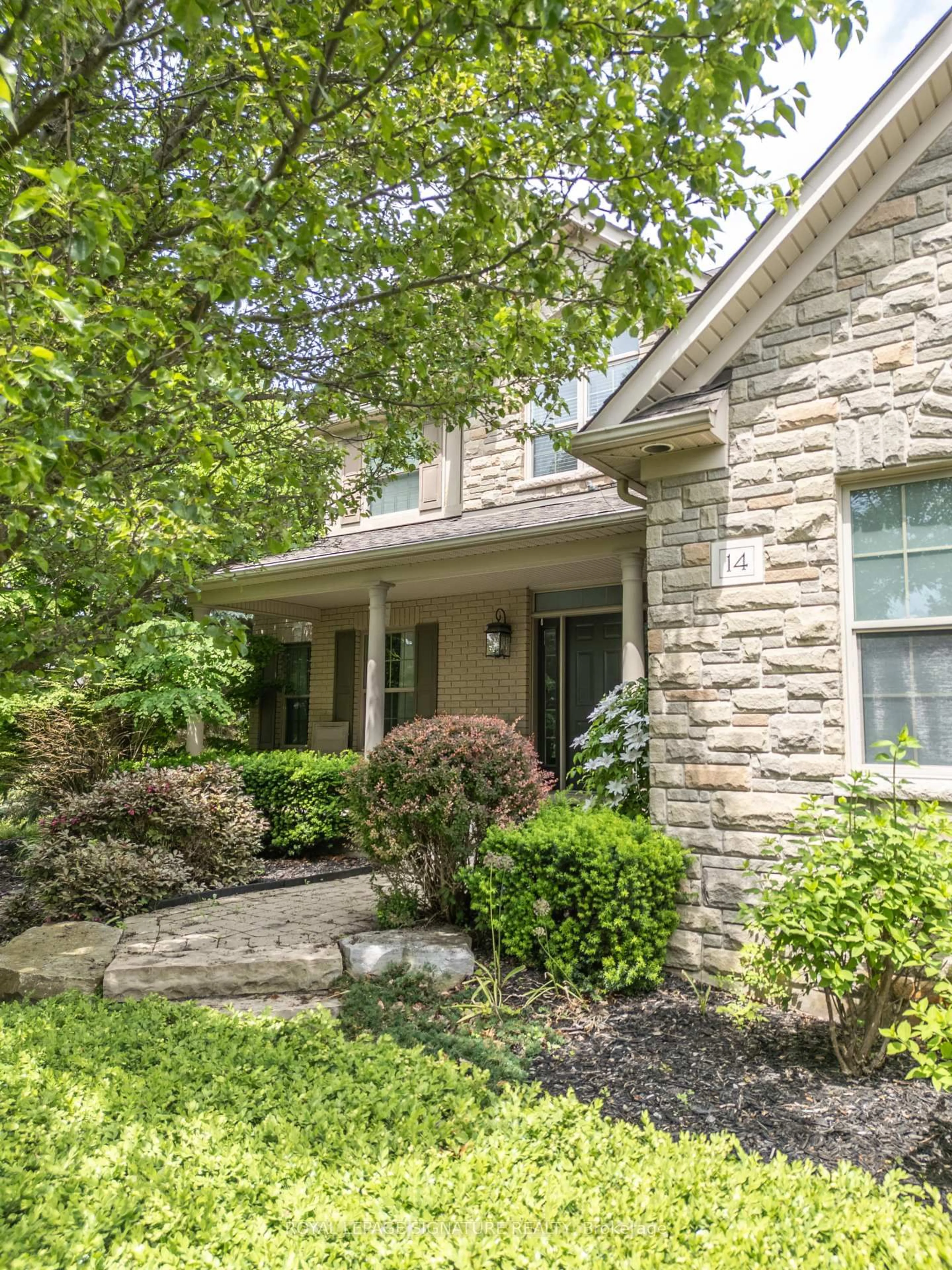 Home with brick exterior material, street for 14 Richard Butler Dr, Whitby Ontario L0B 1A0