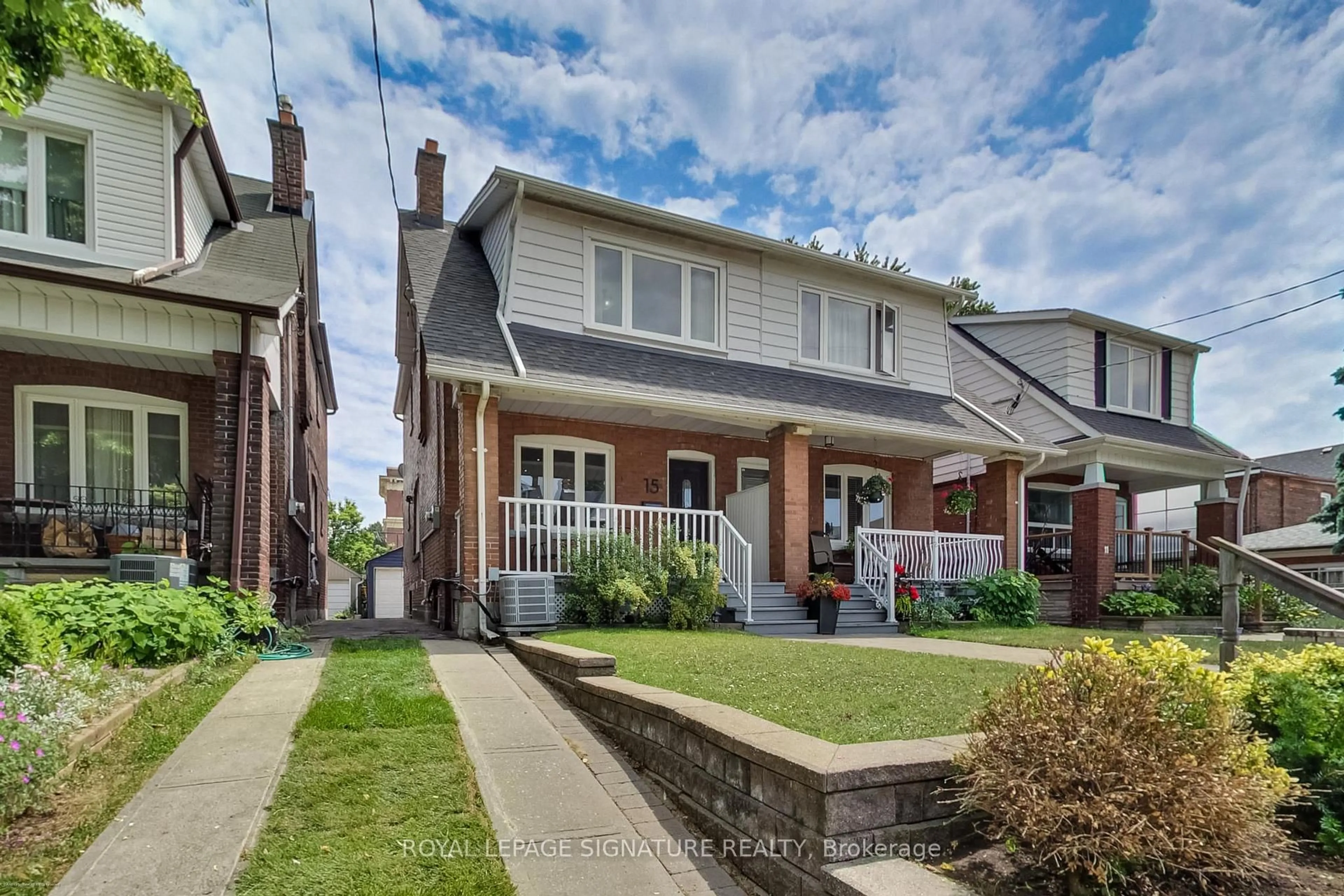 Home with brick exterior material, street for 15 Glebeholme Blvd, Toronto Ontario M4J 1S3
