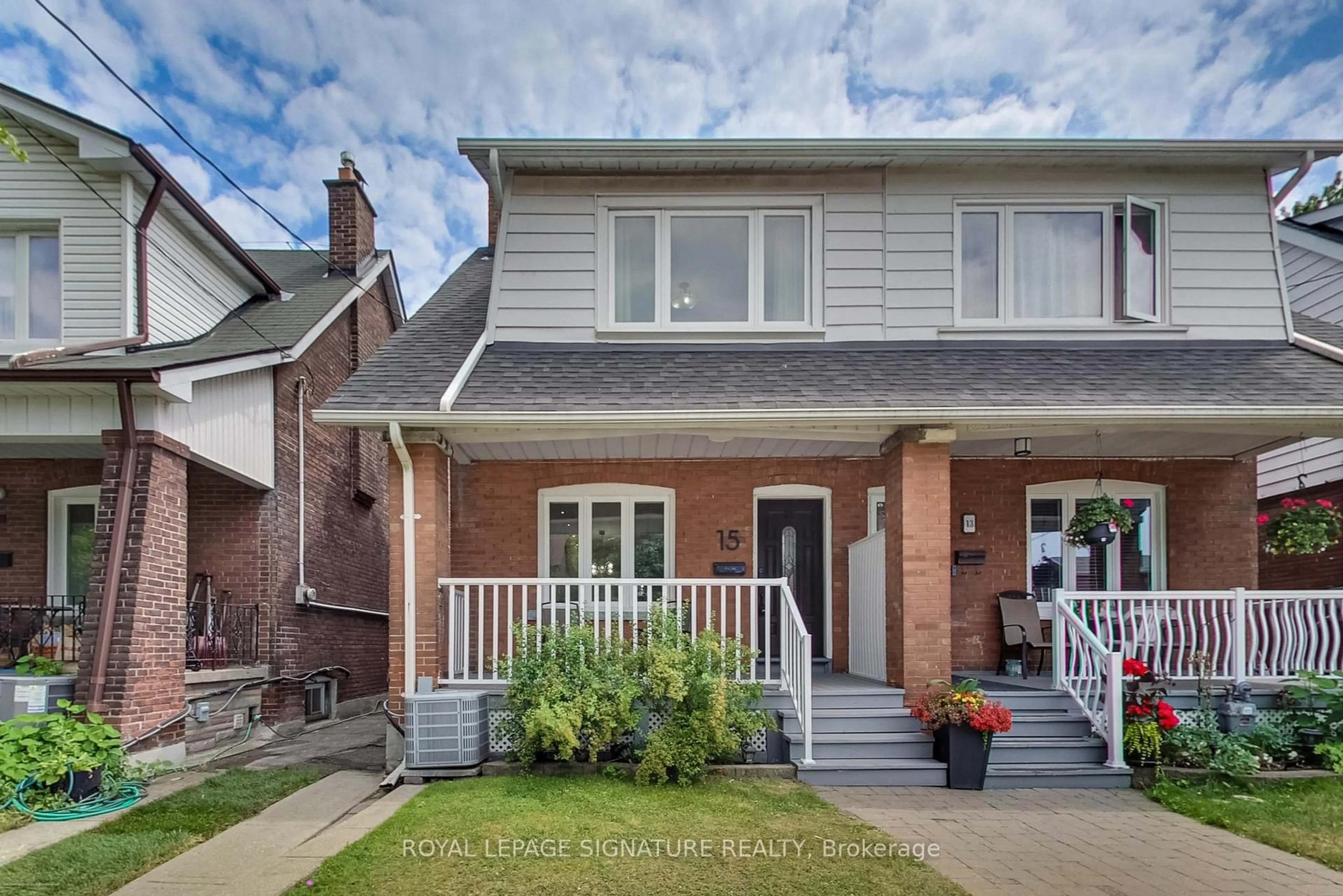 Home with brick exterior material, street for 15 Glebeholme Blvd, Toronto Ontario M4J 1S3