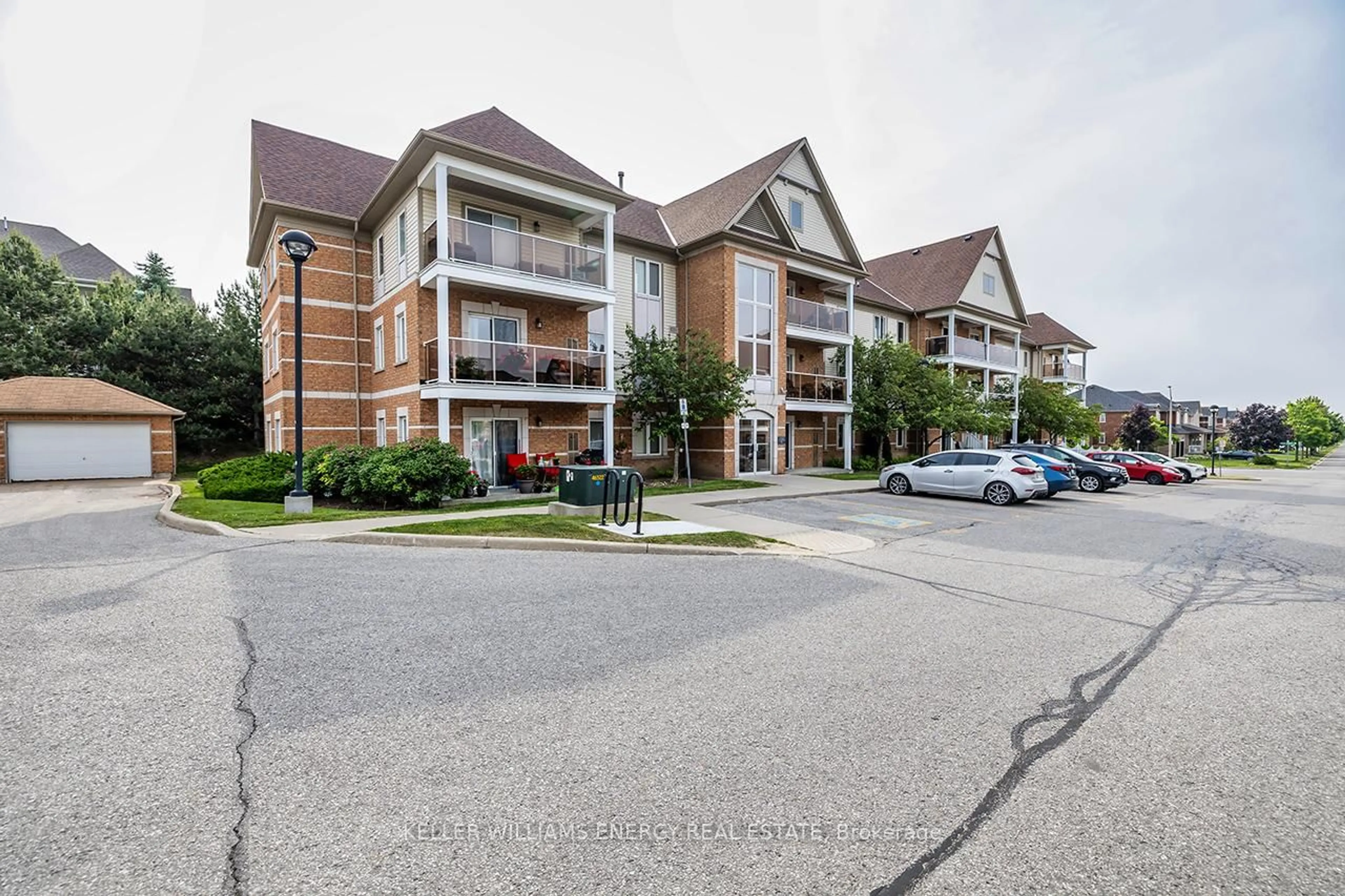 A pic from outside/outdoor area/front of a property/back of a property/a pic from drone, street for 120 Aspen Springs Dr #302, Clarington Ontario L1C 0G7