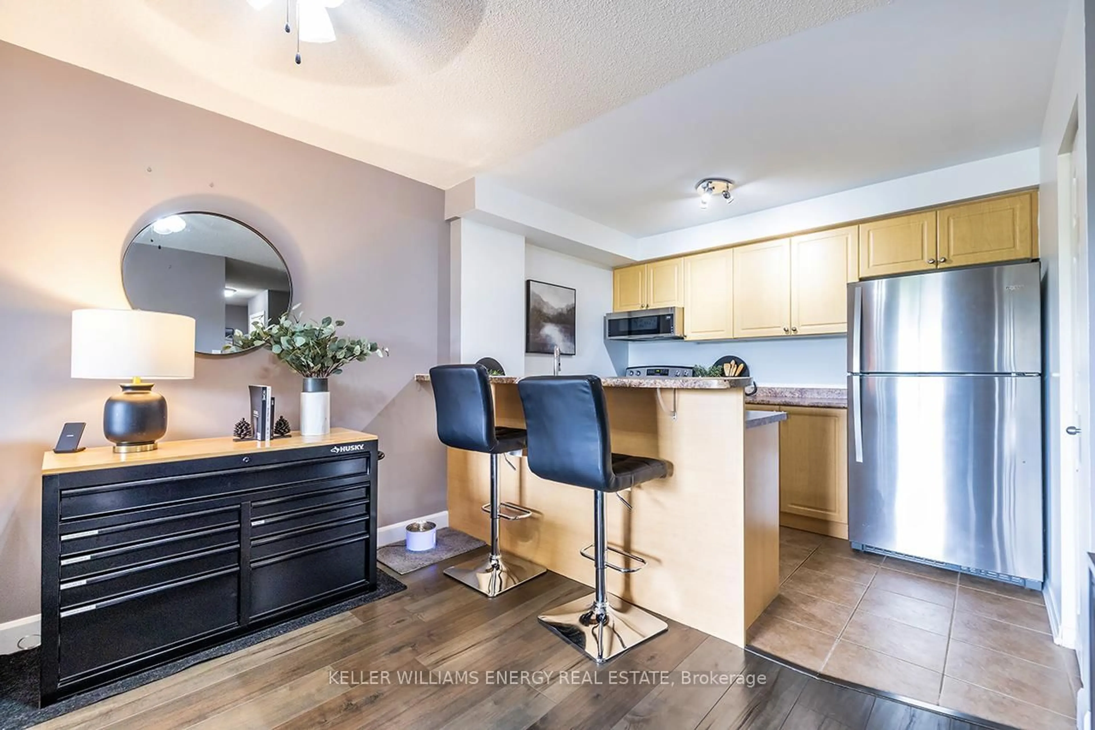 Open concept kitchen, wood/laminate floor for 120 Aspen Springs Dr #302, Clarington Ontario L1C 0G7