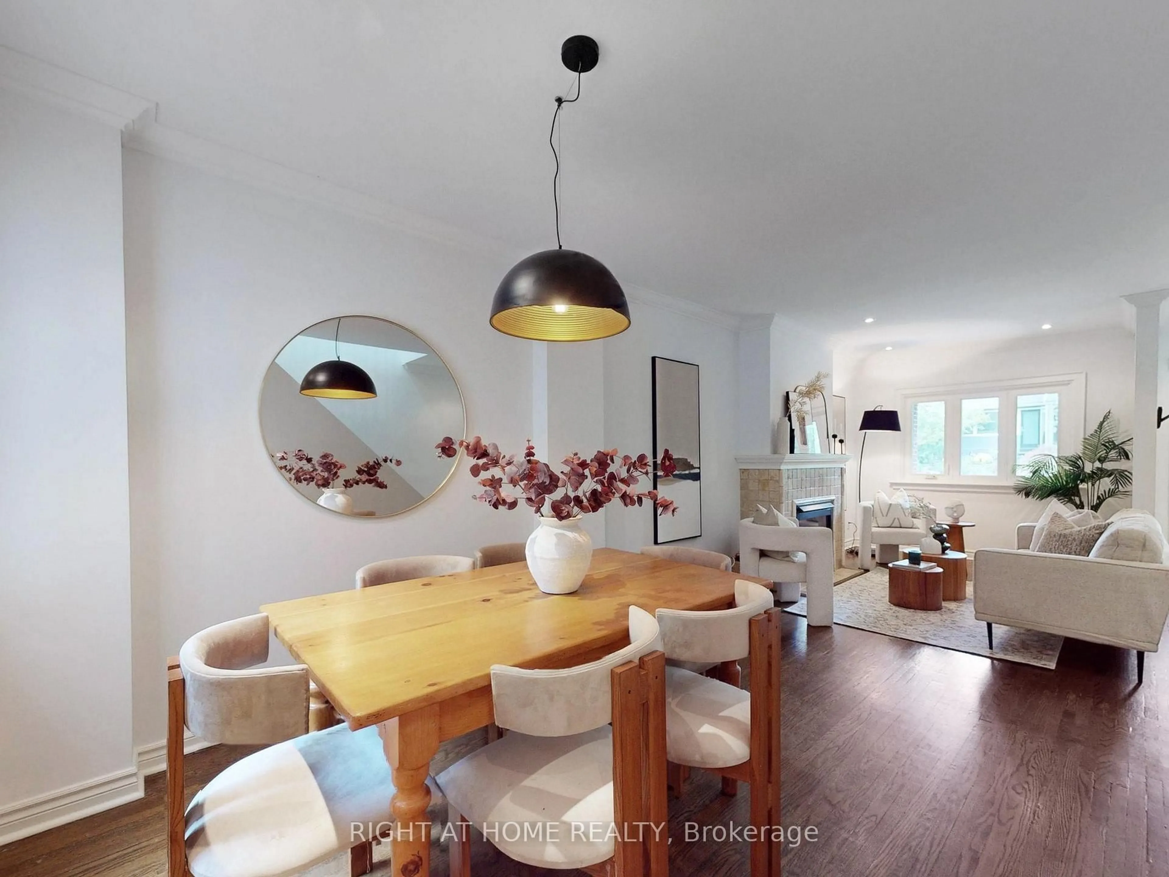 Dining room, wood/laminate floor for 18 Kingsmount Park Rd, Toronto Ontario M4L 3L1