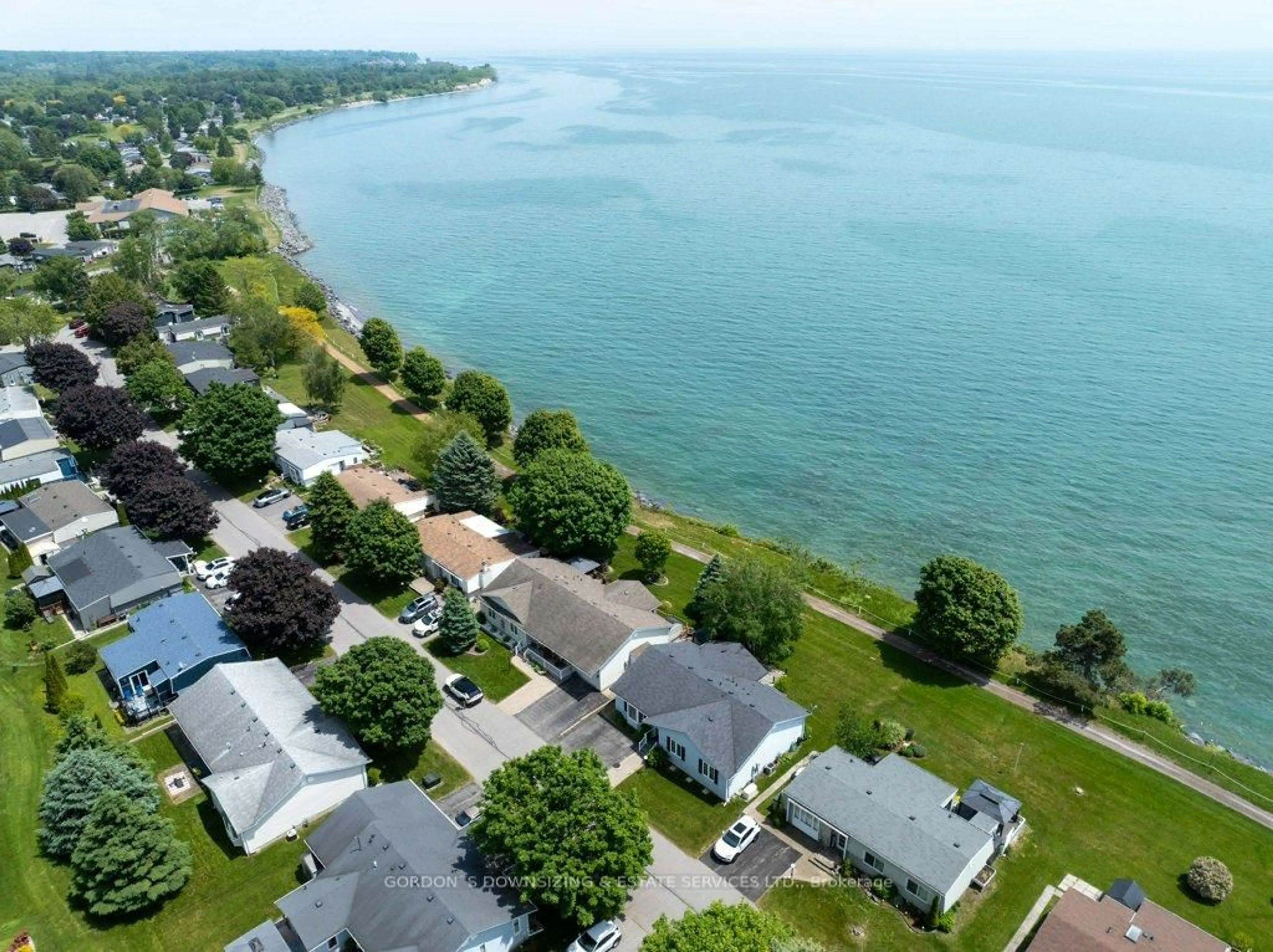 A pic from outside/outdoor area/front of a property/back of a property/a pic from drone, water/lake/river/ocean view for 75 Bluffs Rd, Clarington Ontario L1B 1A6