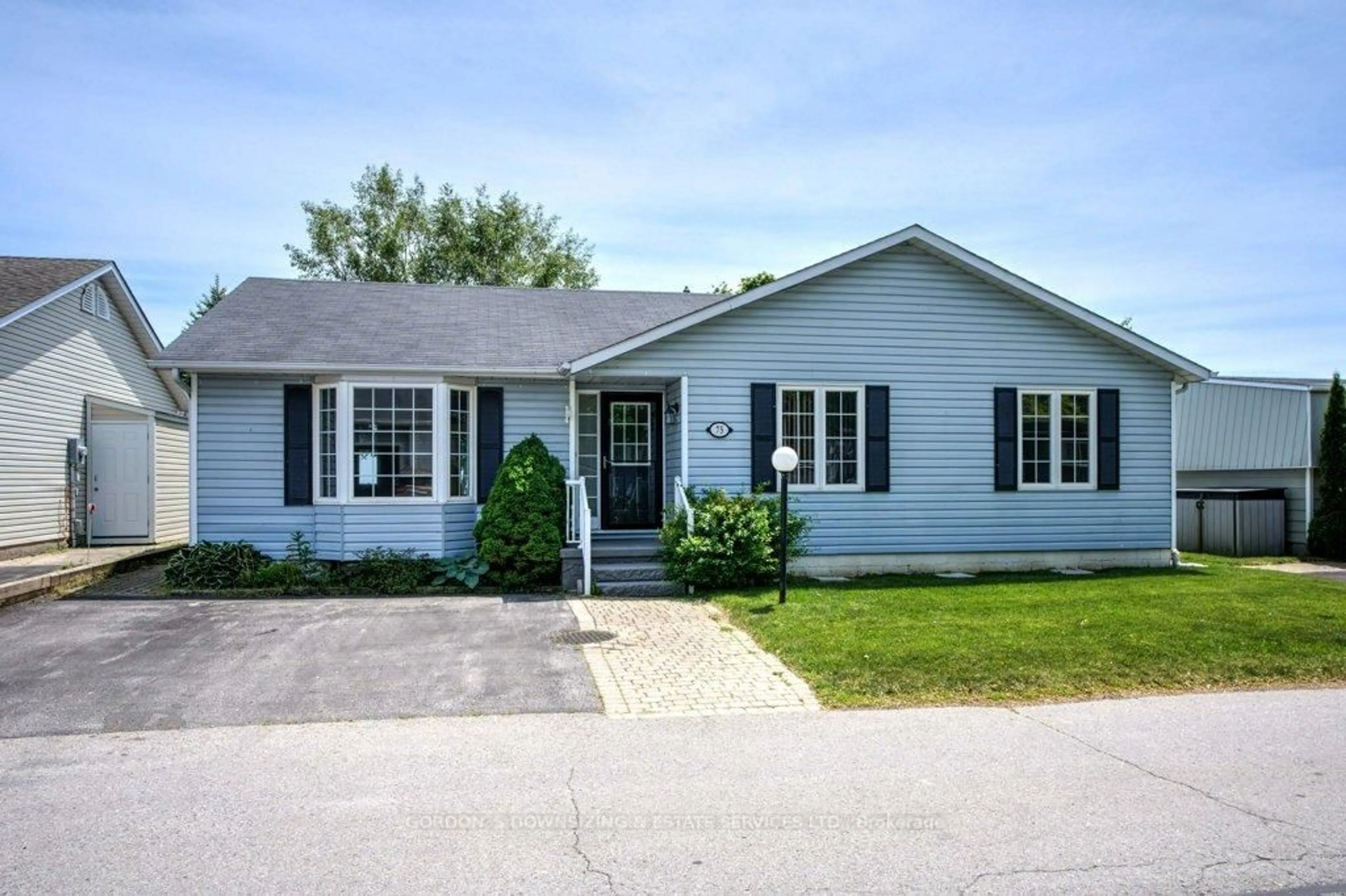 Home with vinyl exterior material, street for 75 Bluffs Rd, Clarington Ontario L1B 1A6