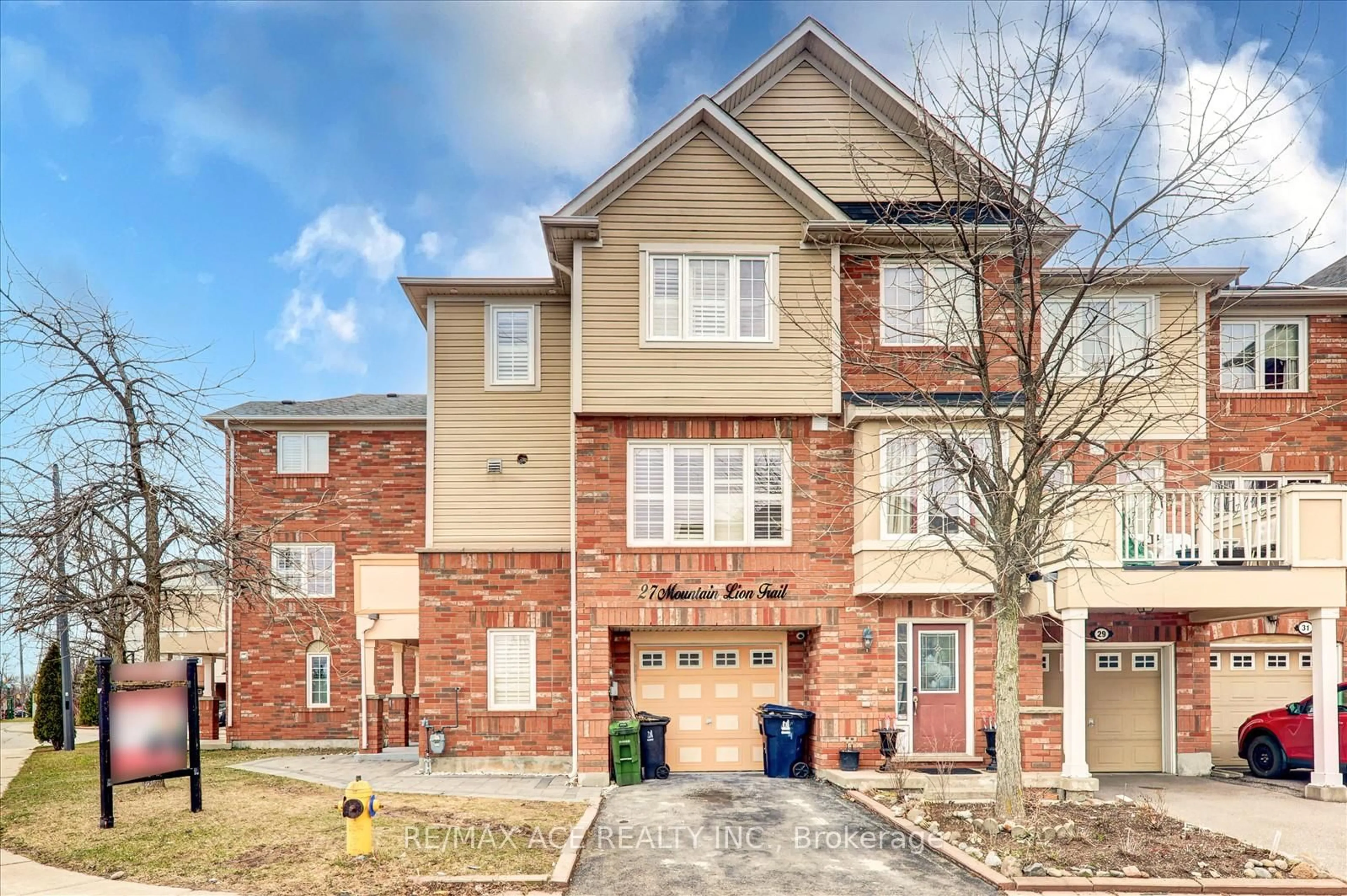 Home with brick exterior material, street for 27 Mountain Lion Tr, Toronto Ontario M1B 0A9