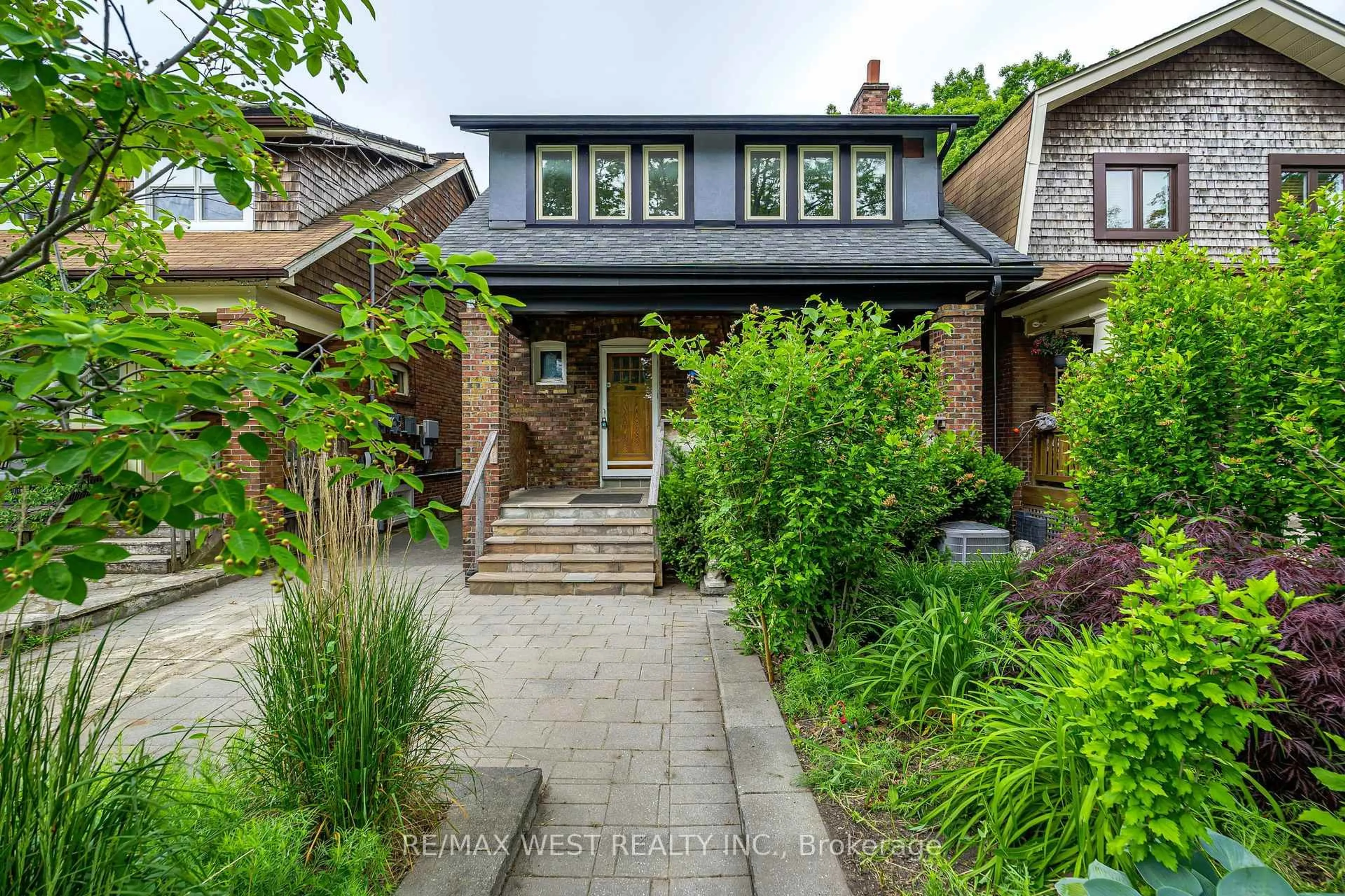 Home with brick exterior material, street for 38 Beck Ave, Toronto Ontario M4C 4L5