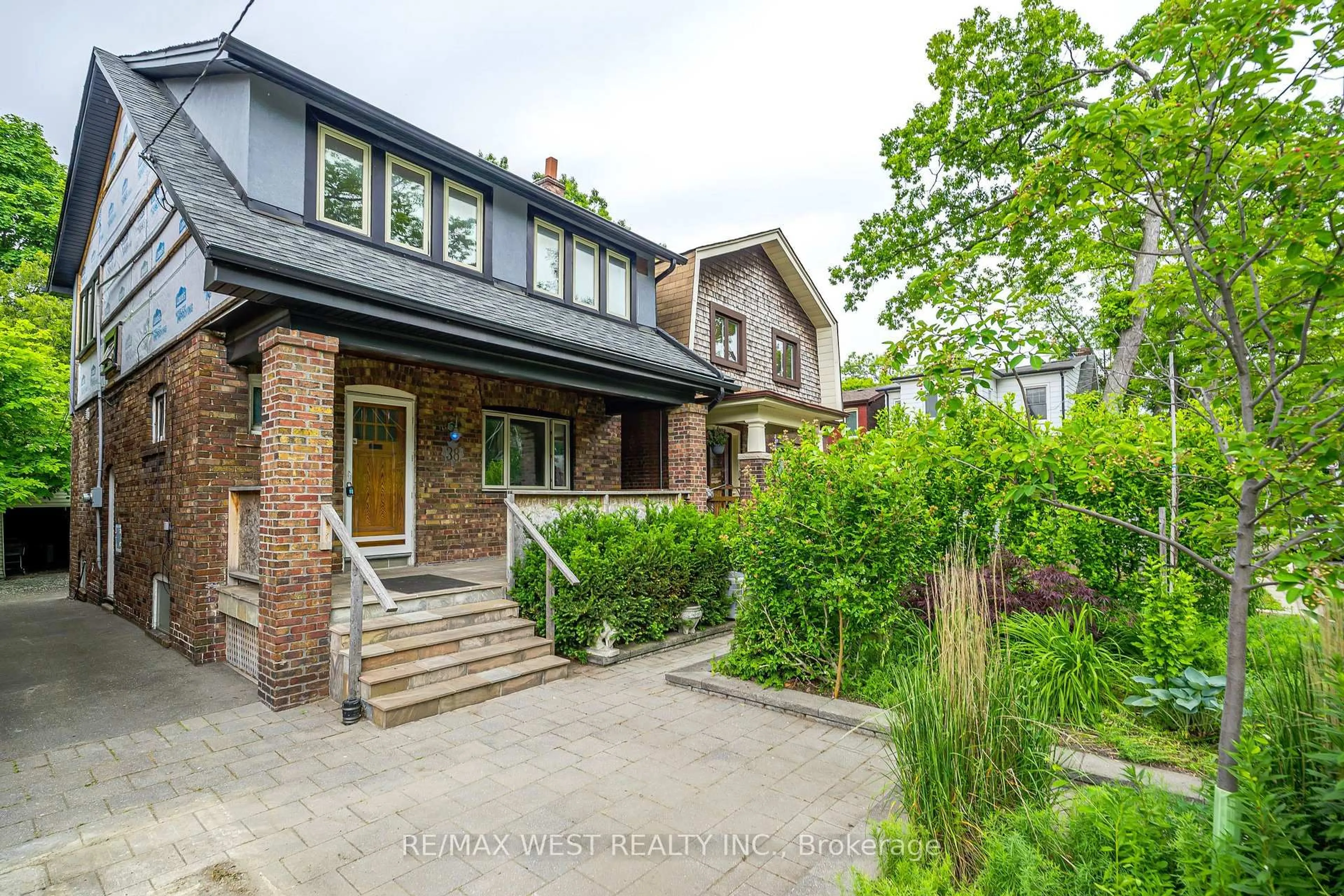 Home with brick exterior material, street for 38 Beck Ave, Toronto Ontario M4C 4L5