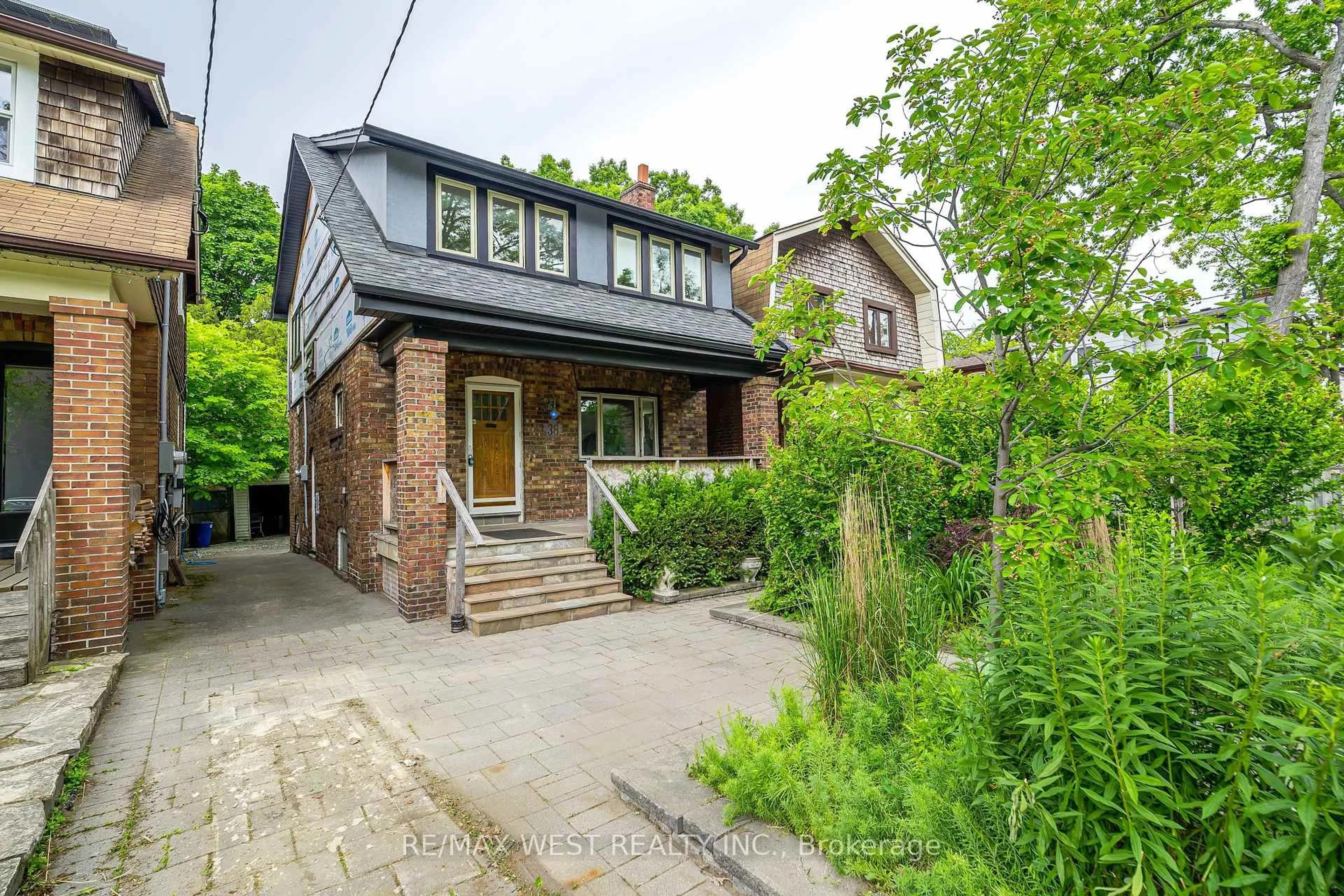 Home with brick exterior material, street for 38 Beck Ave, Toronto Ontario M4C 4L5
