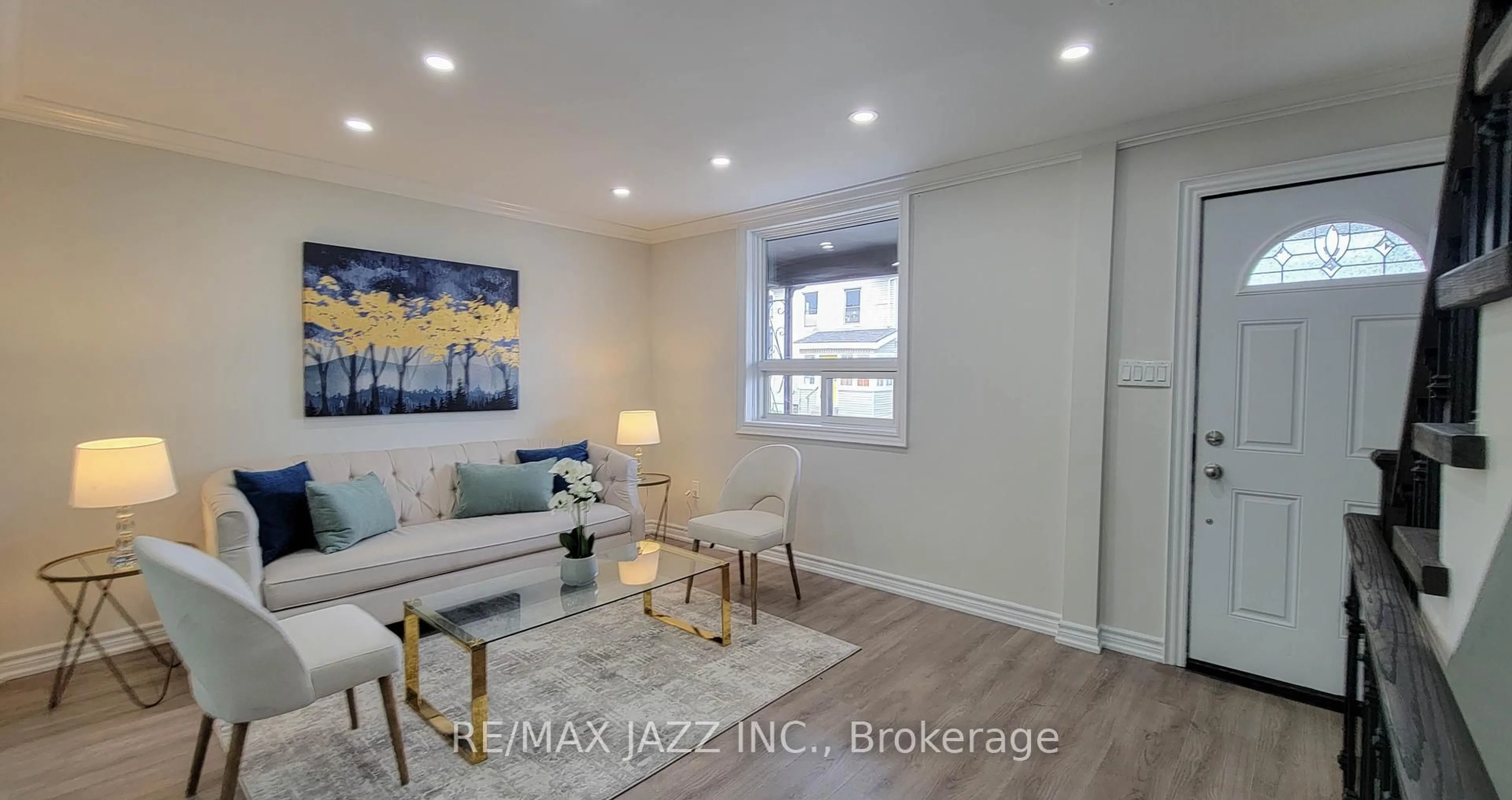 Living room with furniture, wood/laminate floor for 7 Maple St, Oshawa Ontario L1H 2L6