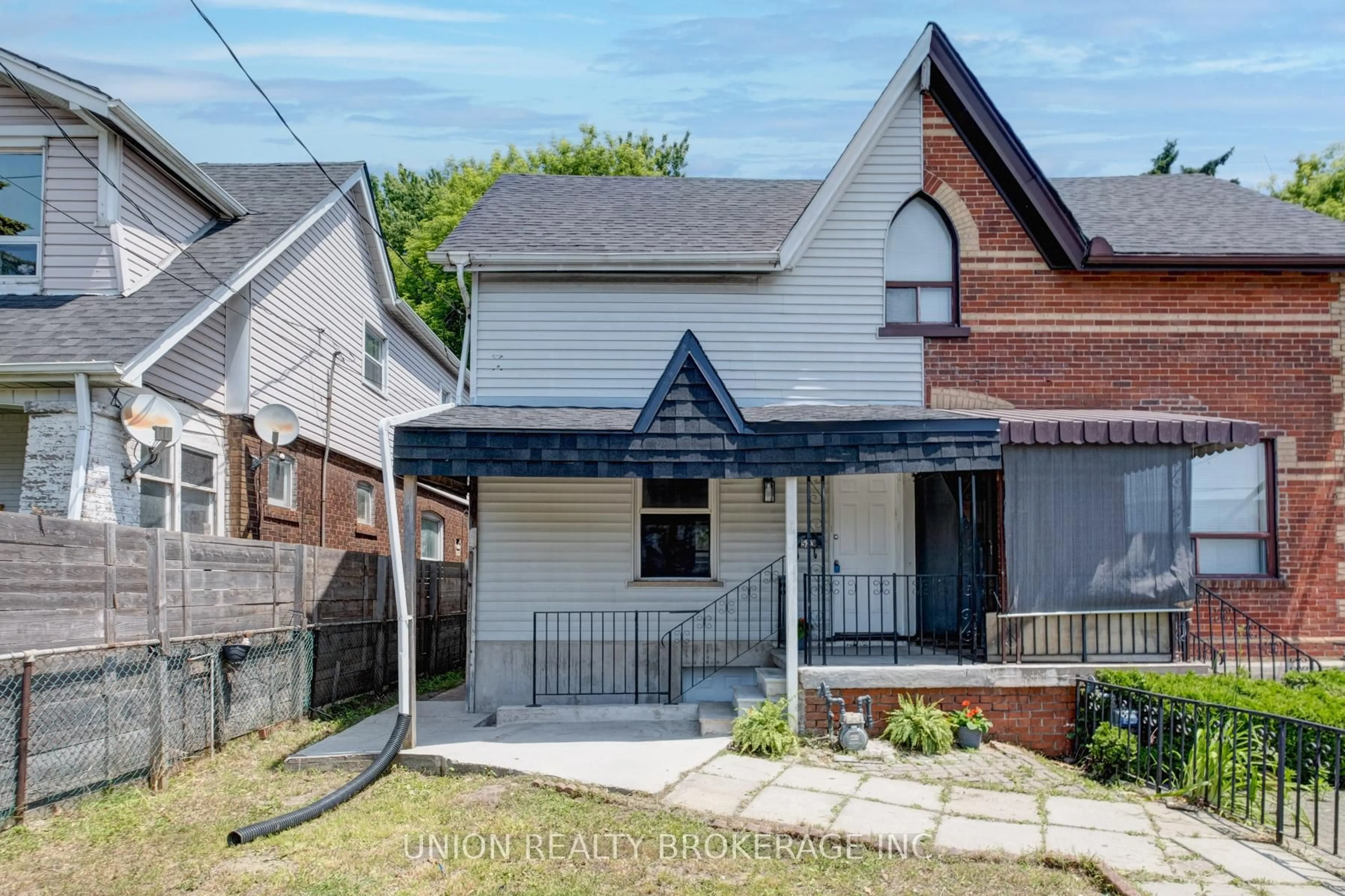 Home with brick exterior material, street for 533 Victoria Park Ave, Toronto Ontario M4C 5H2