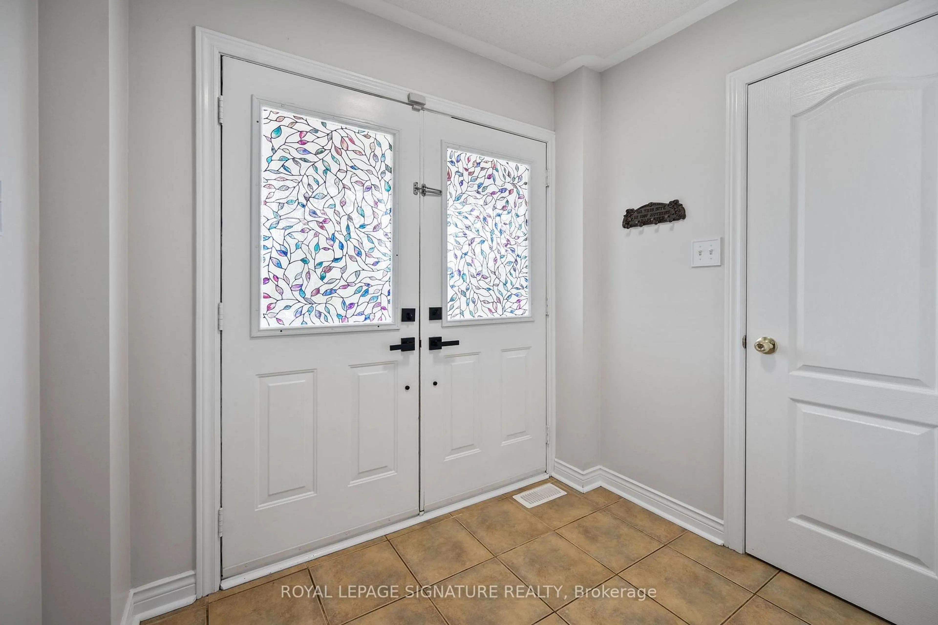 Indoor entryway for 6 Lurosa Cres, Whitby Ontario L1R 3A9